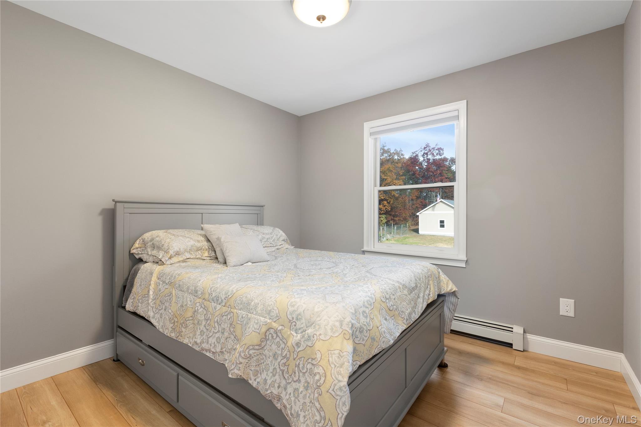 216 N Road Red Hook, NY 12571 - Photo 12 of 20 a bedroom with a bed and window