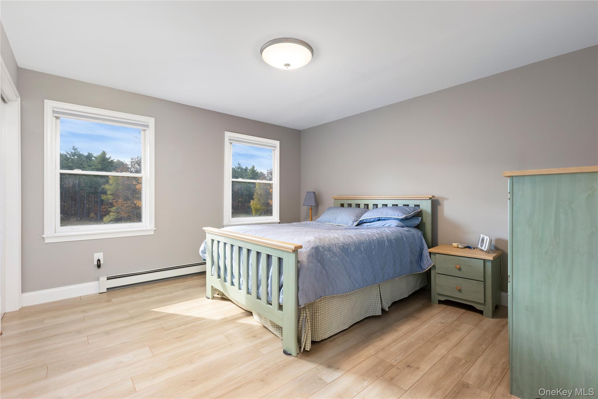 216 N Road Red Hook, NY 12571 - Photo 17 of 20 a bedroom with a bed and a window