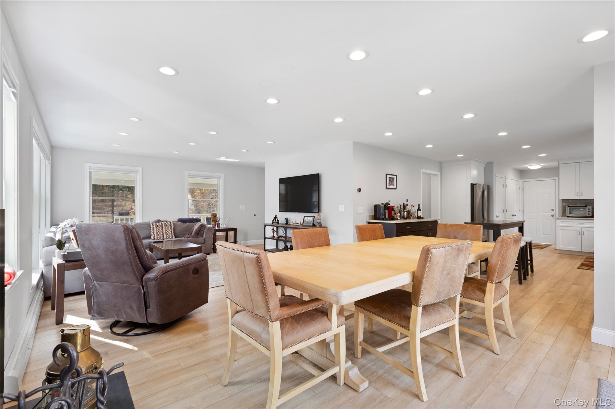 216 N Road Red Hook, NY 12571 - Photo 8 of 20 a living room with furniture and a flat screen tv