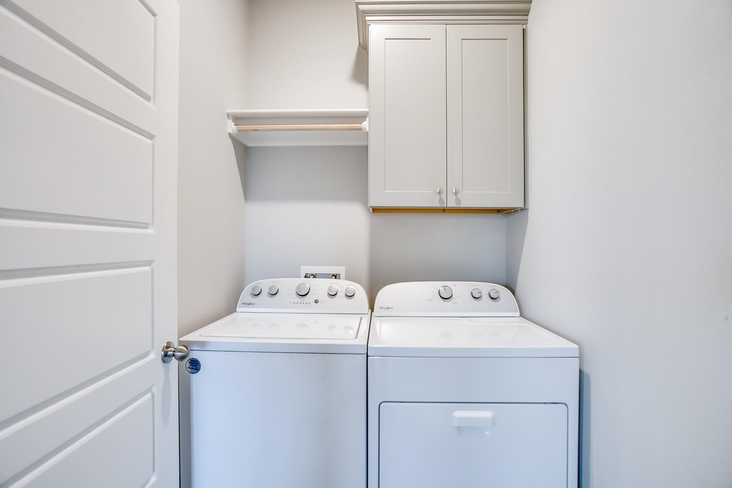 5804 Winfield Avenue Lubbock, TX 79407 - Photo 13 of 18 a utility room with dryer and washer