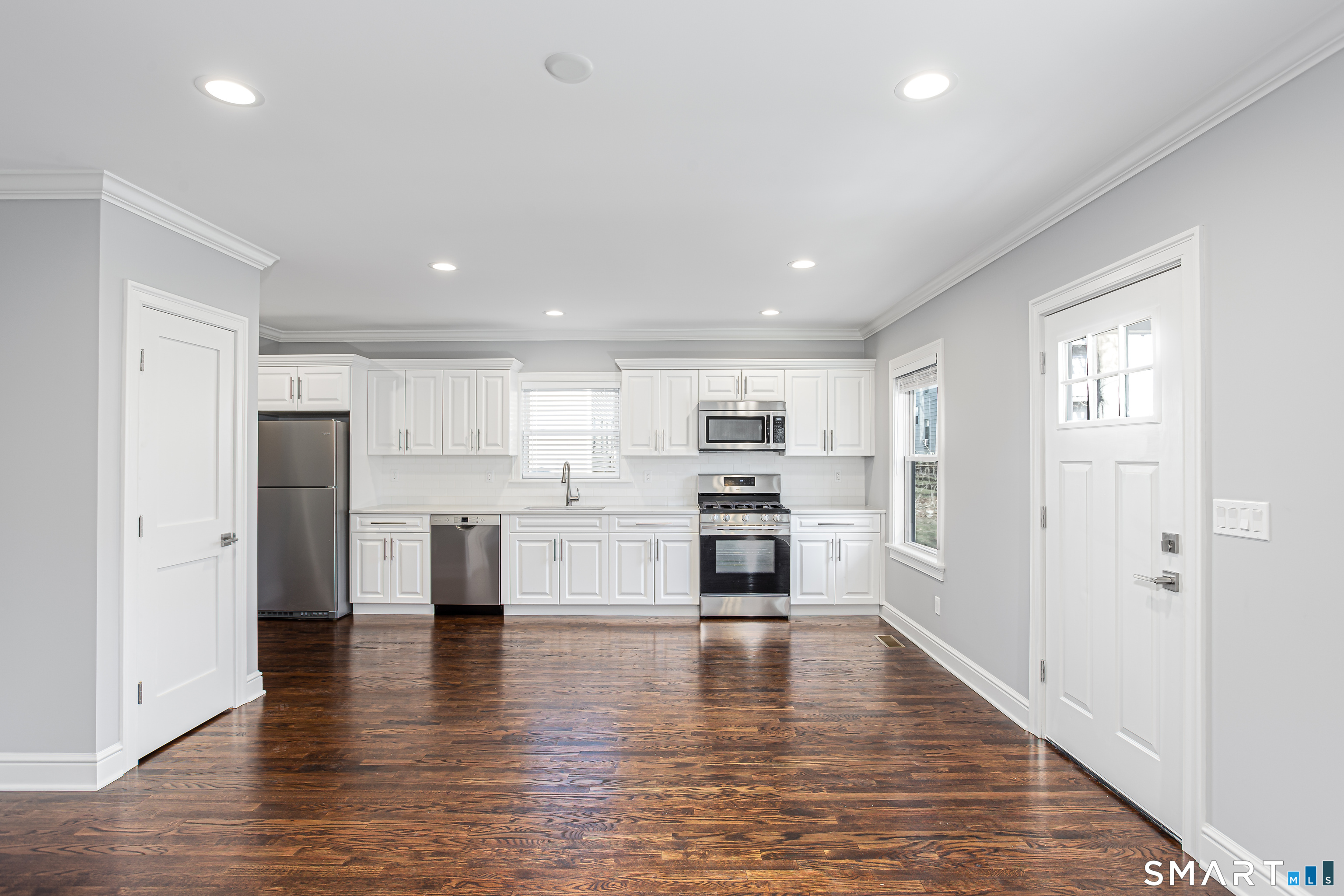 65 Mason Street Fairfield, CT 06825 - Photo 16 of 30 a view of kitchen with wooden floor