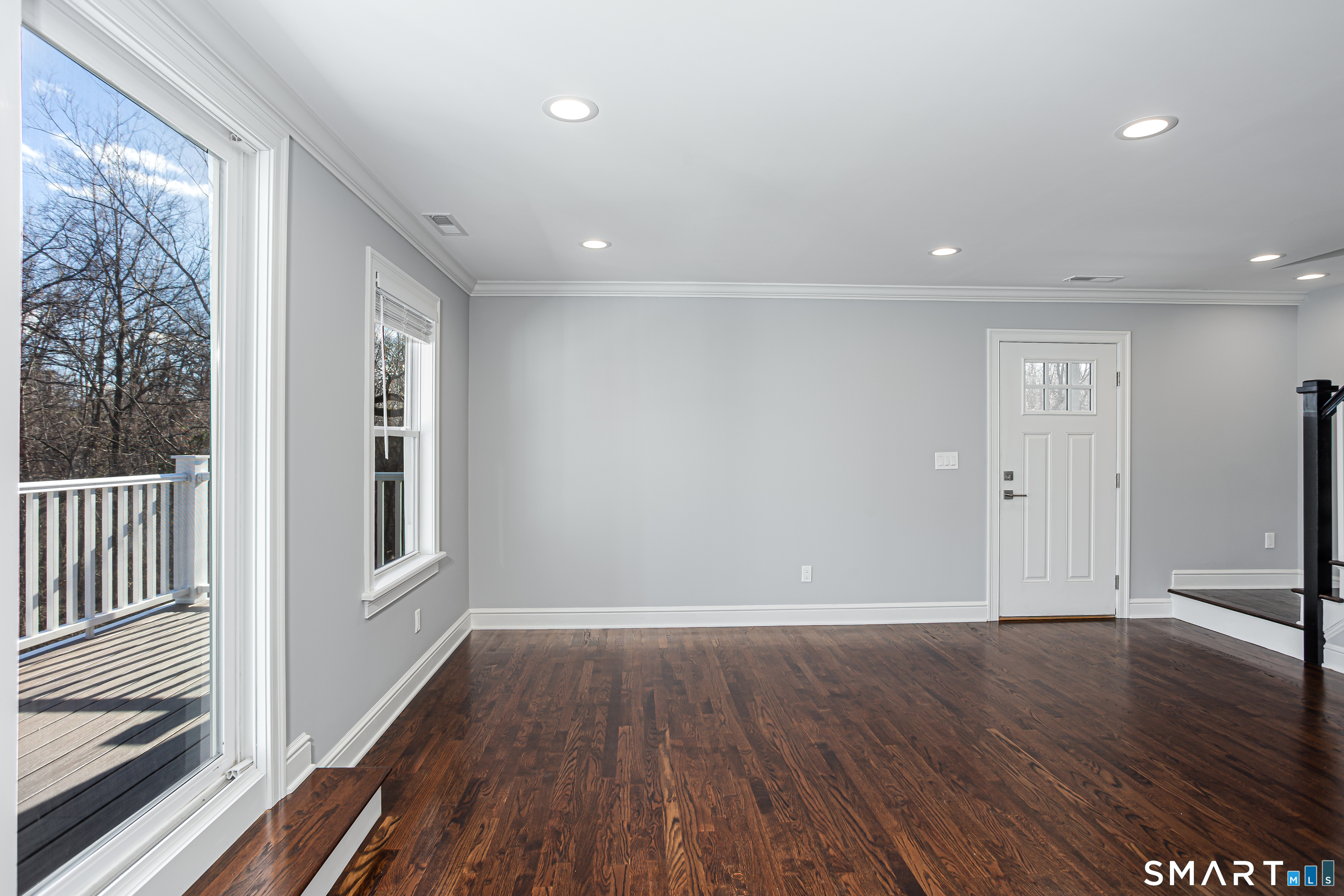 65 Mason Street Fairfield, CT 06825 - Photo 20 of 30 wooden floor in an empty room with a window