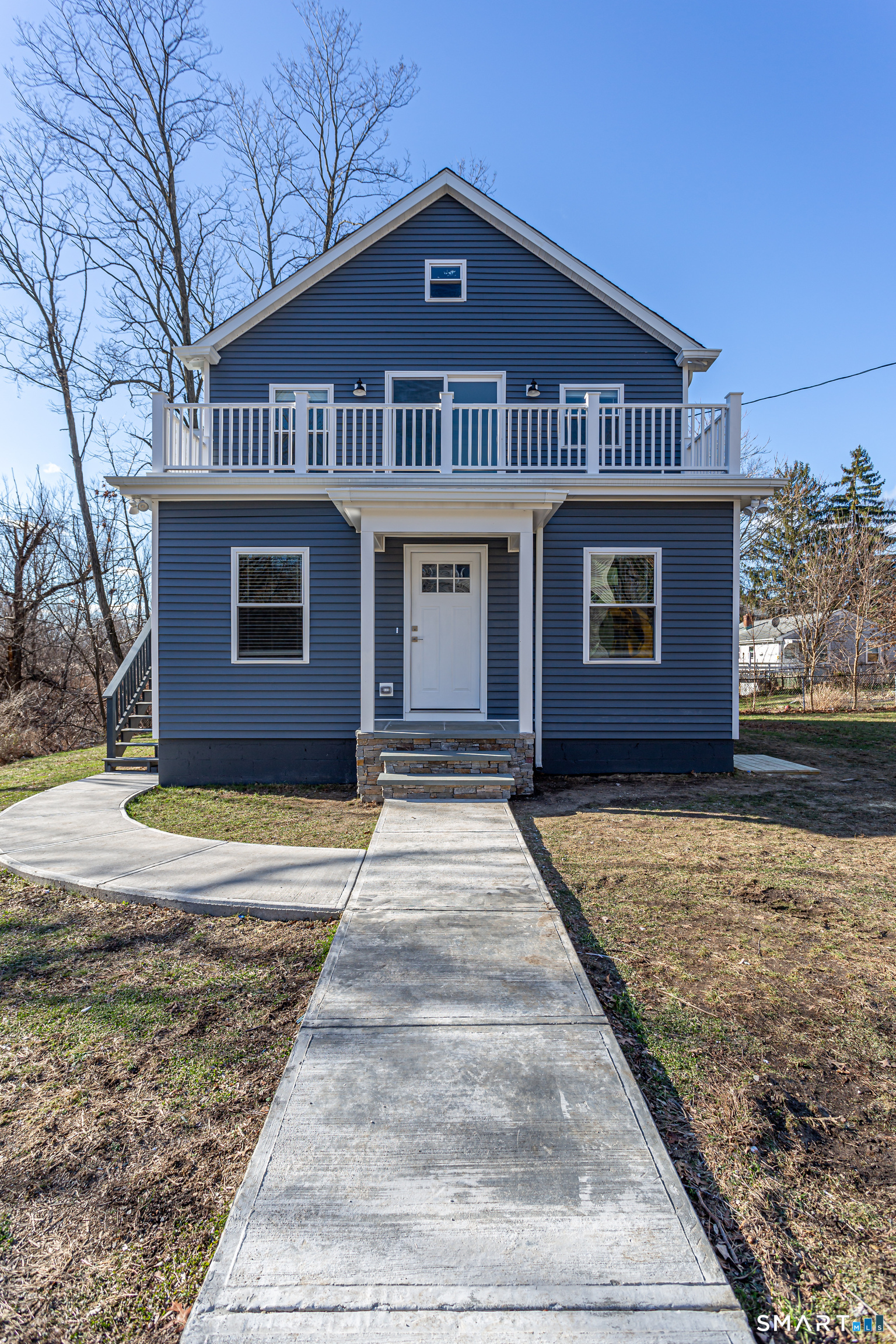 65 Mason Street Fairfield, CT 06825 - Photo 2 of 30 a front view of a house