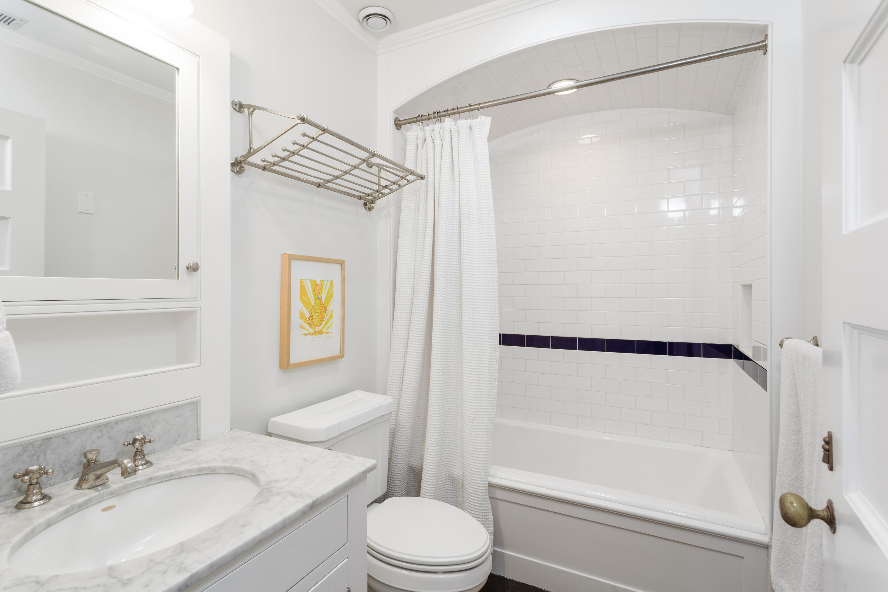 29 Pine Point Road Rowayton, CT 06853 - Photo 11 of 21 a bathroom with a granite countertop sink mirror vanity and toilet