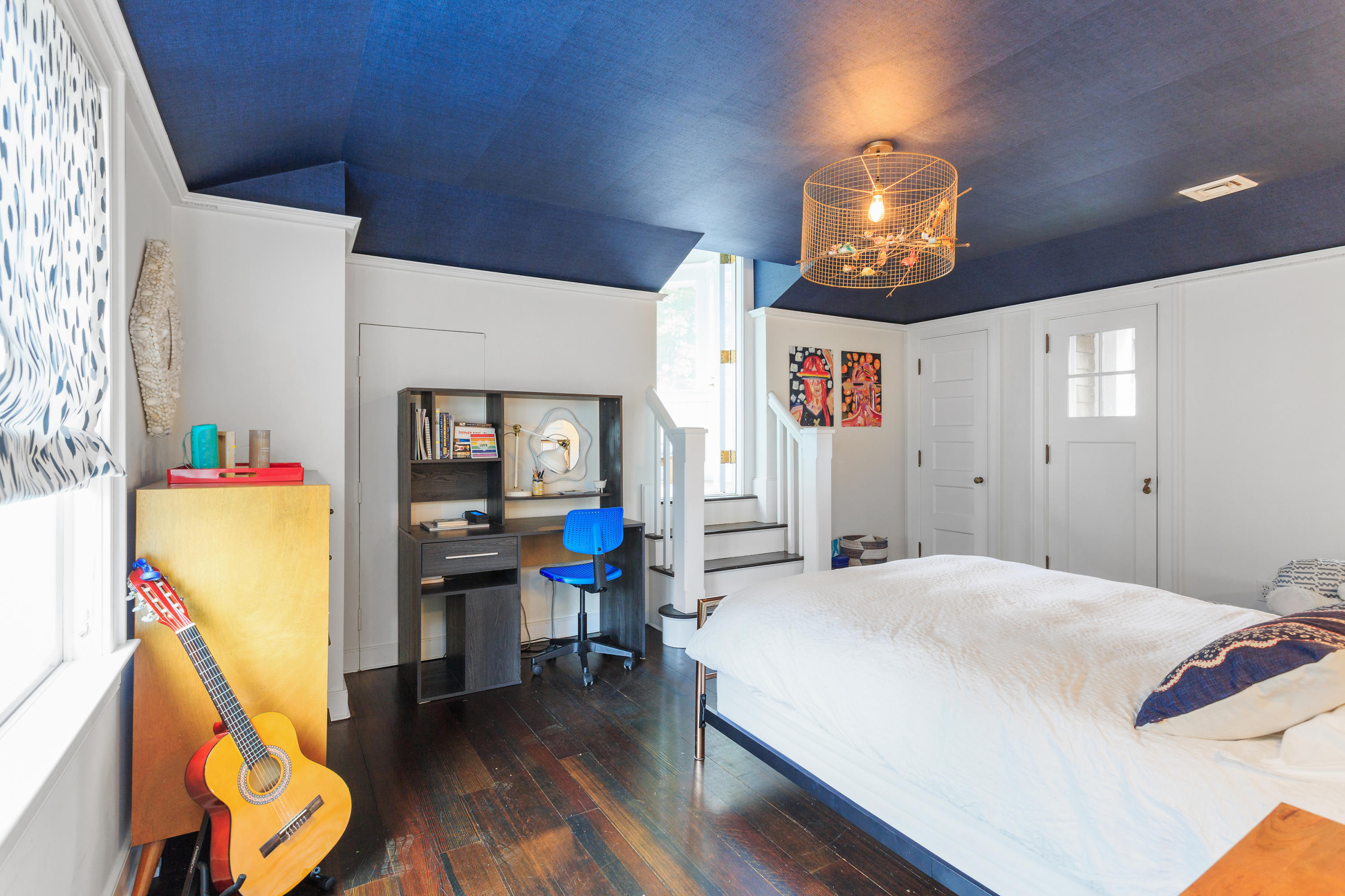 29 Pine Point Road Rowayton, CT 06853 - Photo 12 of 21 a bedroom with a bed and a chandelier