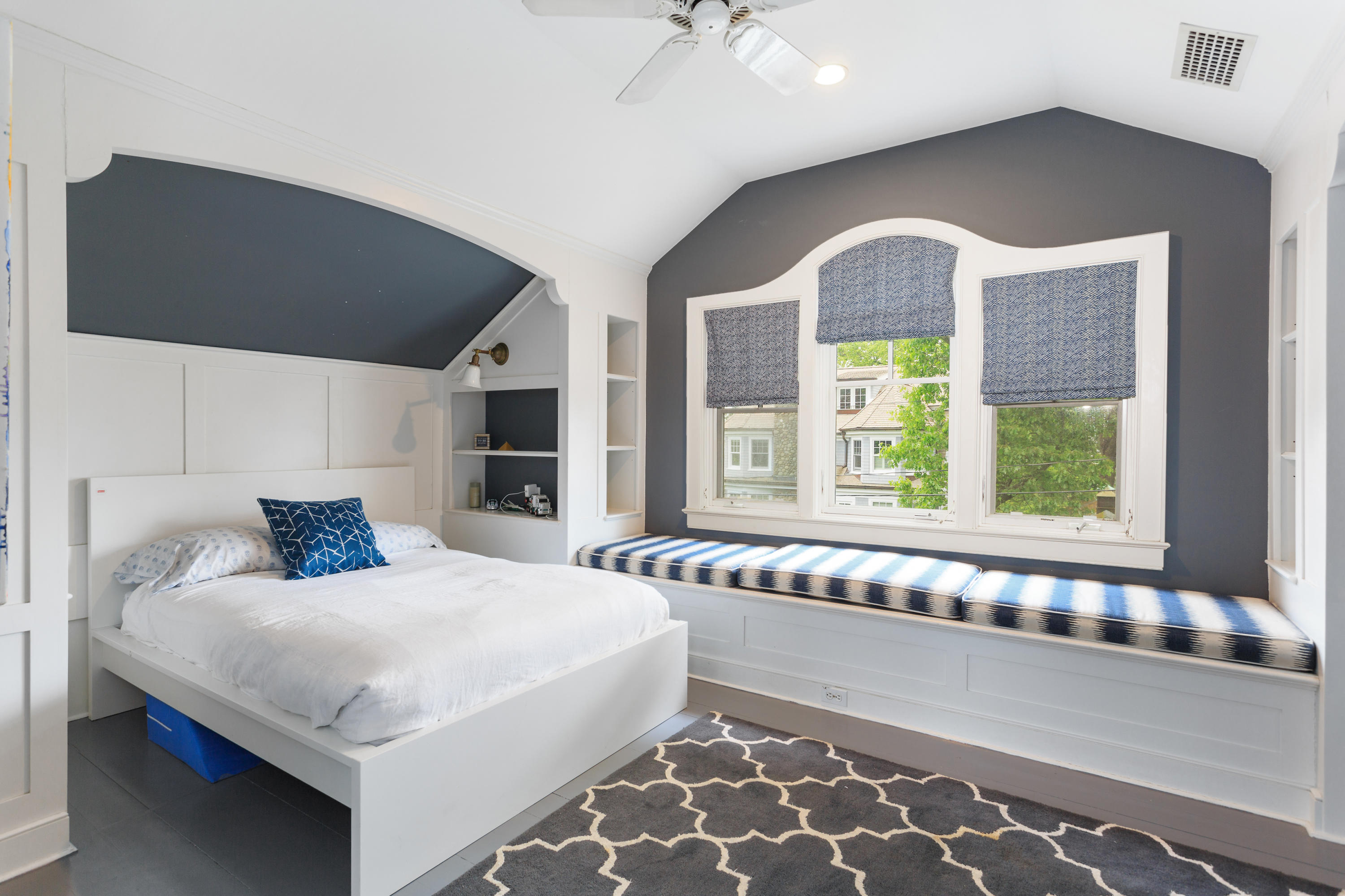 29 Pine Point Road Rowayton, CT 06853 - Photo 15 of 21 a bedroom with a large bed and a large window