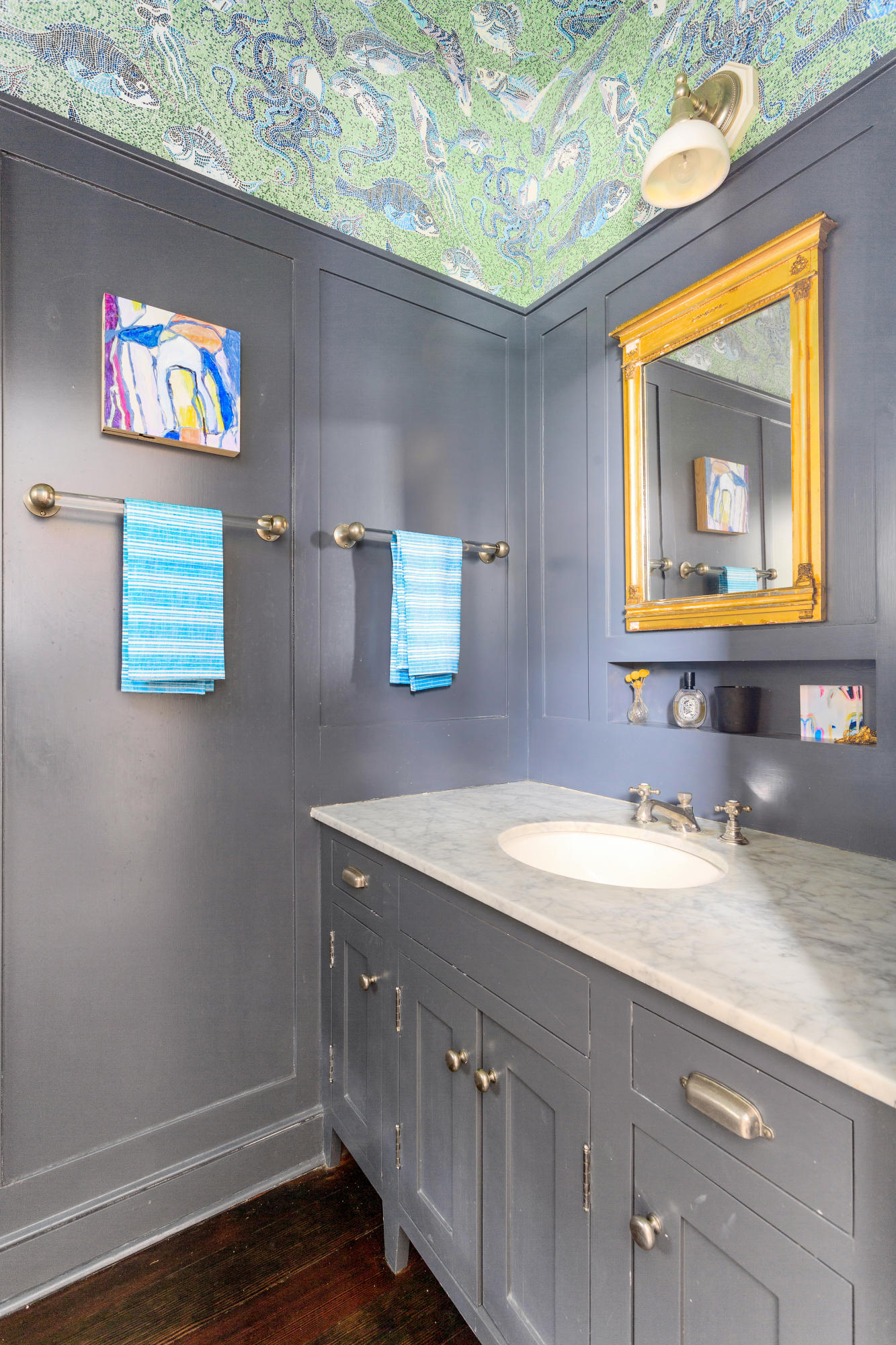 29 Pine Point Road Rowayton, CT 06853 - Photo 17 of 21 a bathroom with a sink a mirror and a picture on the wall