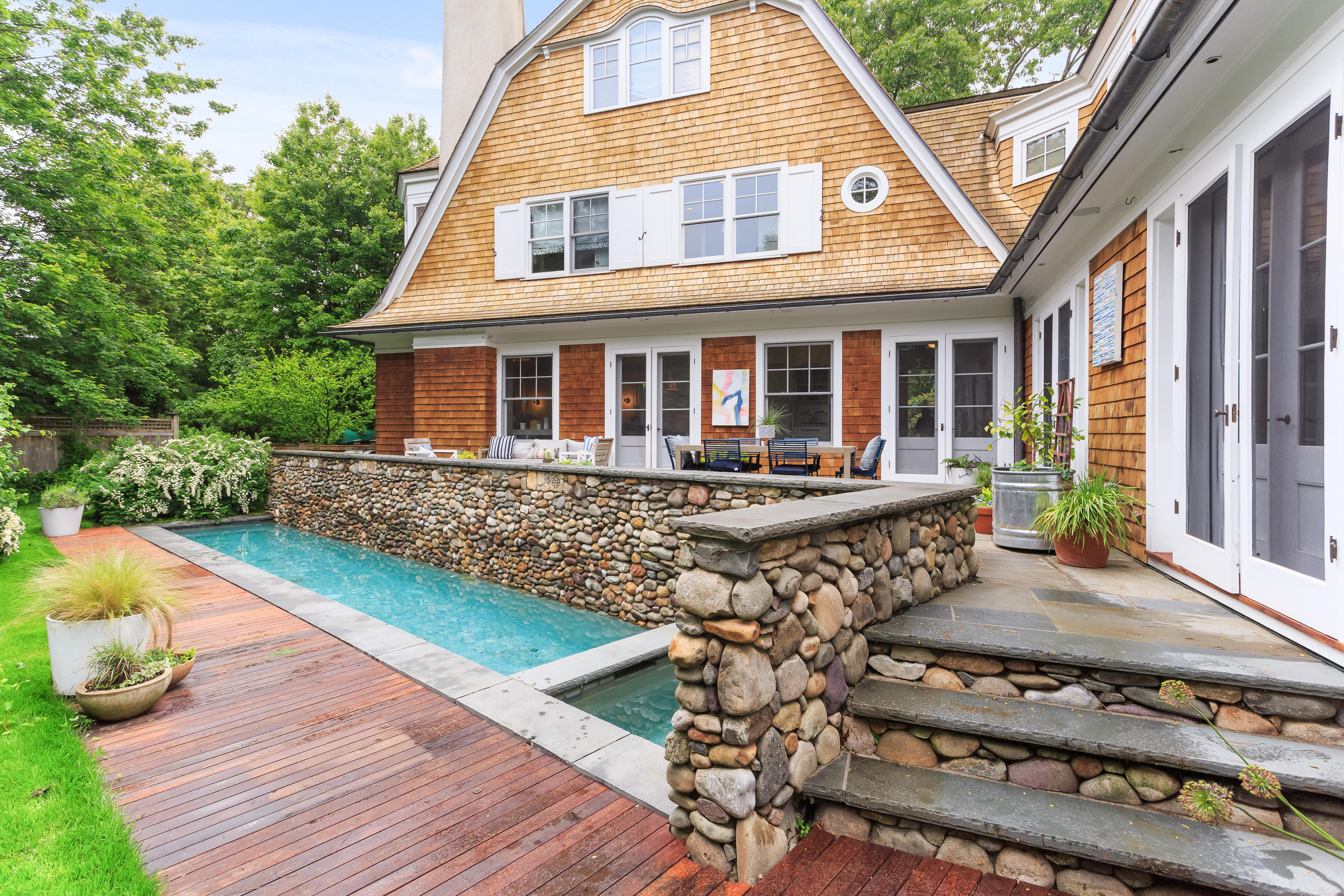 29 Pine Point Road Rowayton, CT 06853 - Photo 18 of 21 a front view of house with a garden and patio