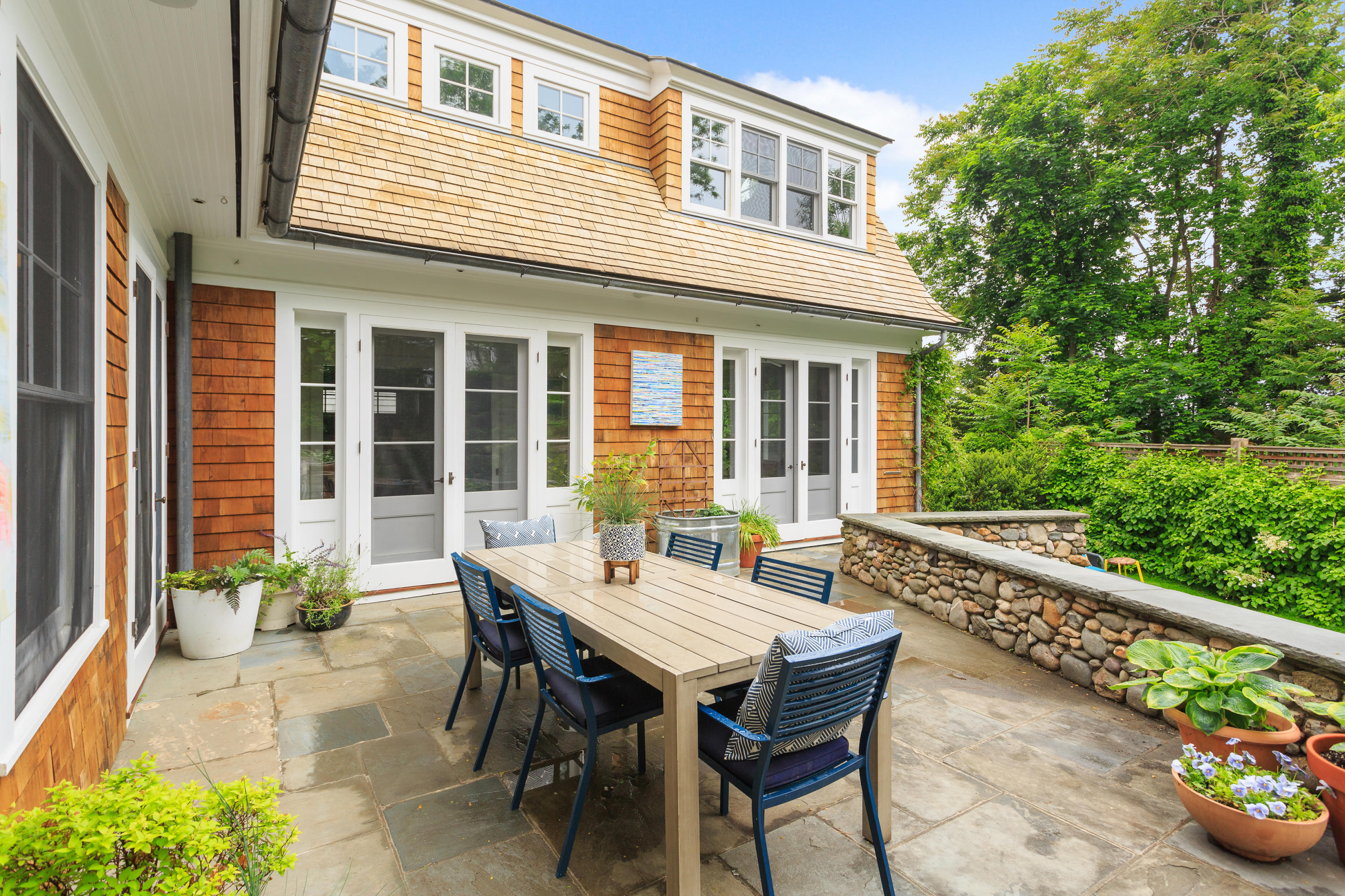 29 Pine Point Road Rowayton, CT 06853 - Photo 20 of 21 a view of a patio with table and chairs and potted plants