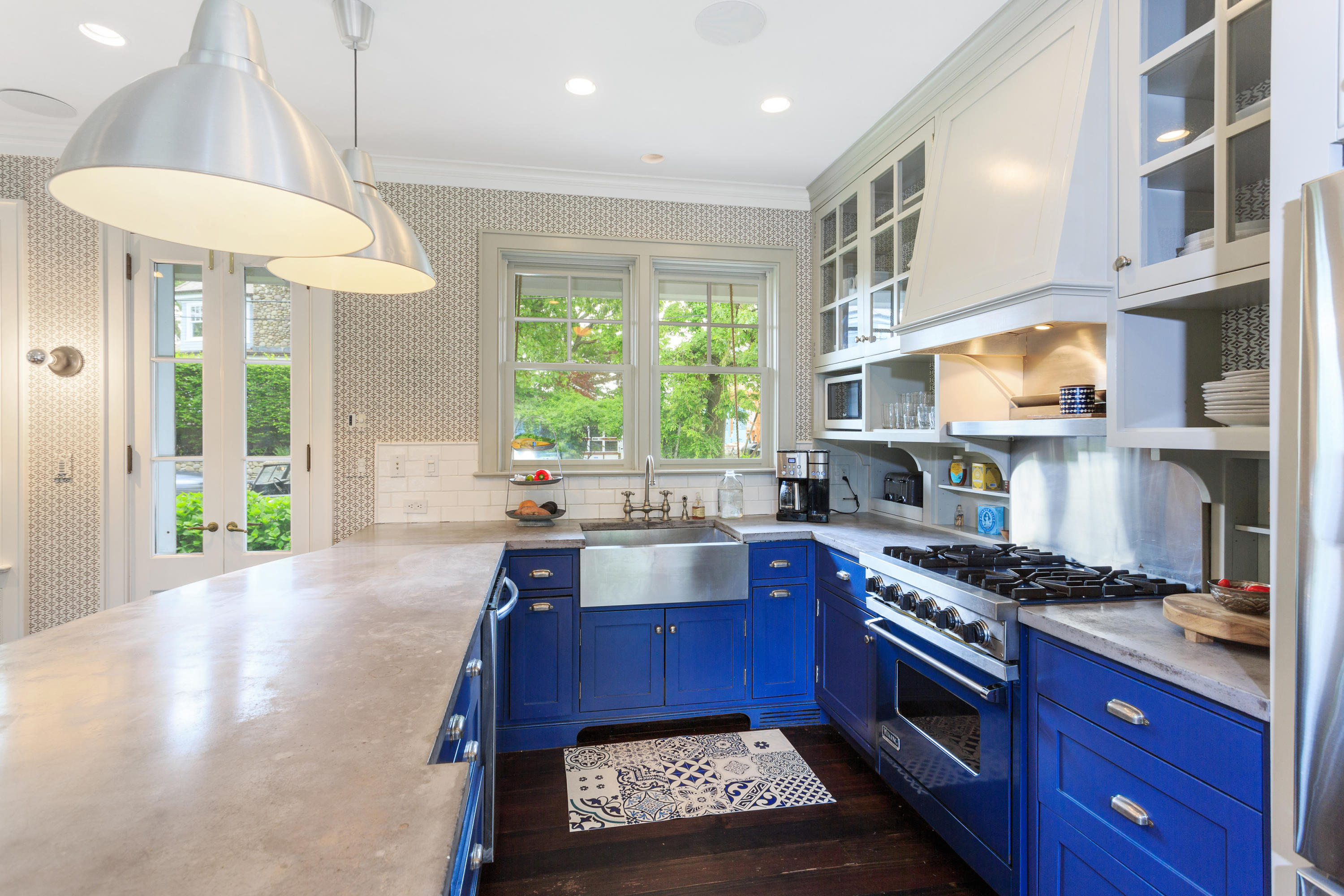 29 Pine Point Road Rowayton, CT 06853 - Photo 3 of 21 a kitchen with stainless steel appliances granite countertop a stove a sink dishwasher and cabinets with wooden floor