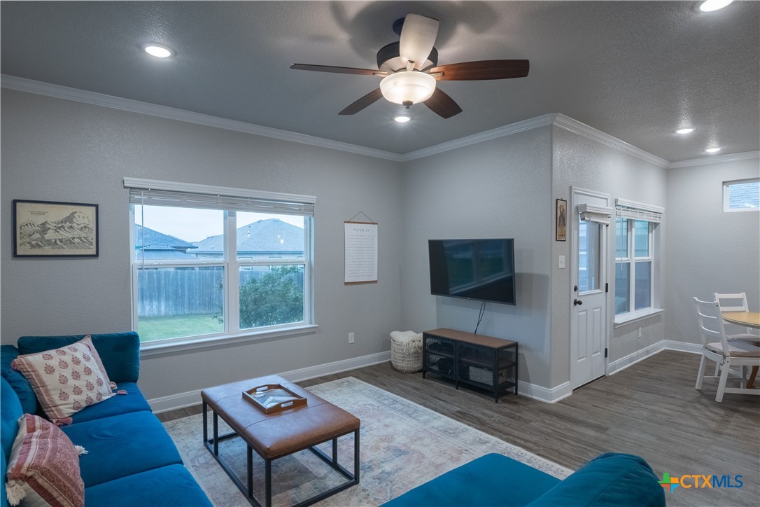 7909 McCulloch Road Temple, TX 76502 - Photo 24 of 46 a living room with furniture a flat screen tv and a window
