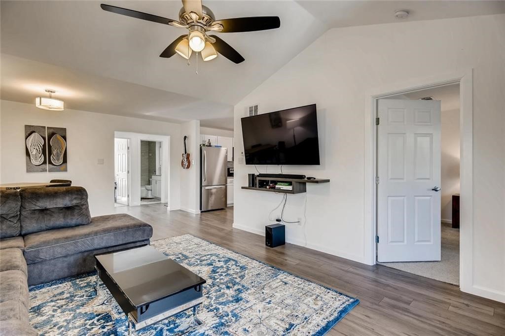 3604 Clawson Road, Unit 304 Austin, TX 78704 - Photo 1 of 1 a living room with furniture and a flat screen tv
