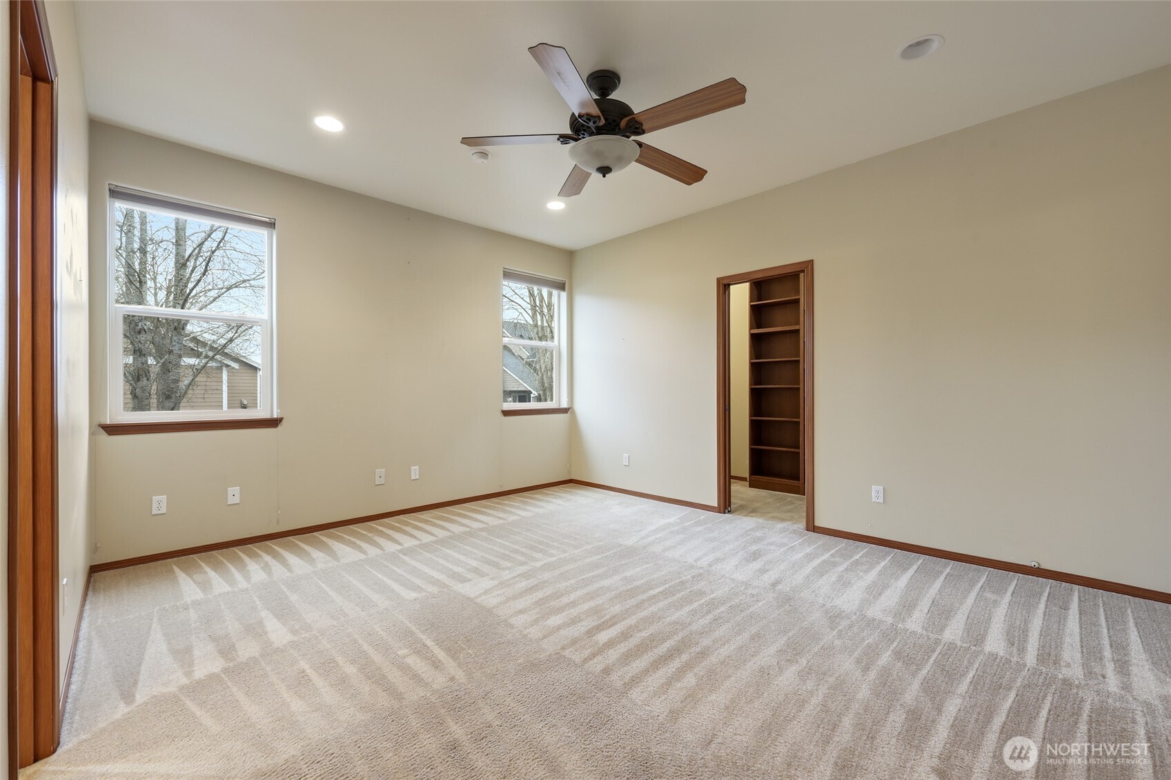 5107 66th Avenue Southeast Lacey, WA 98513 - Photo 13 of 27 a view of an empty room with a window