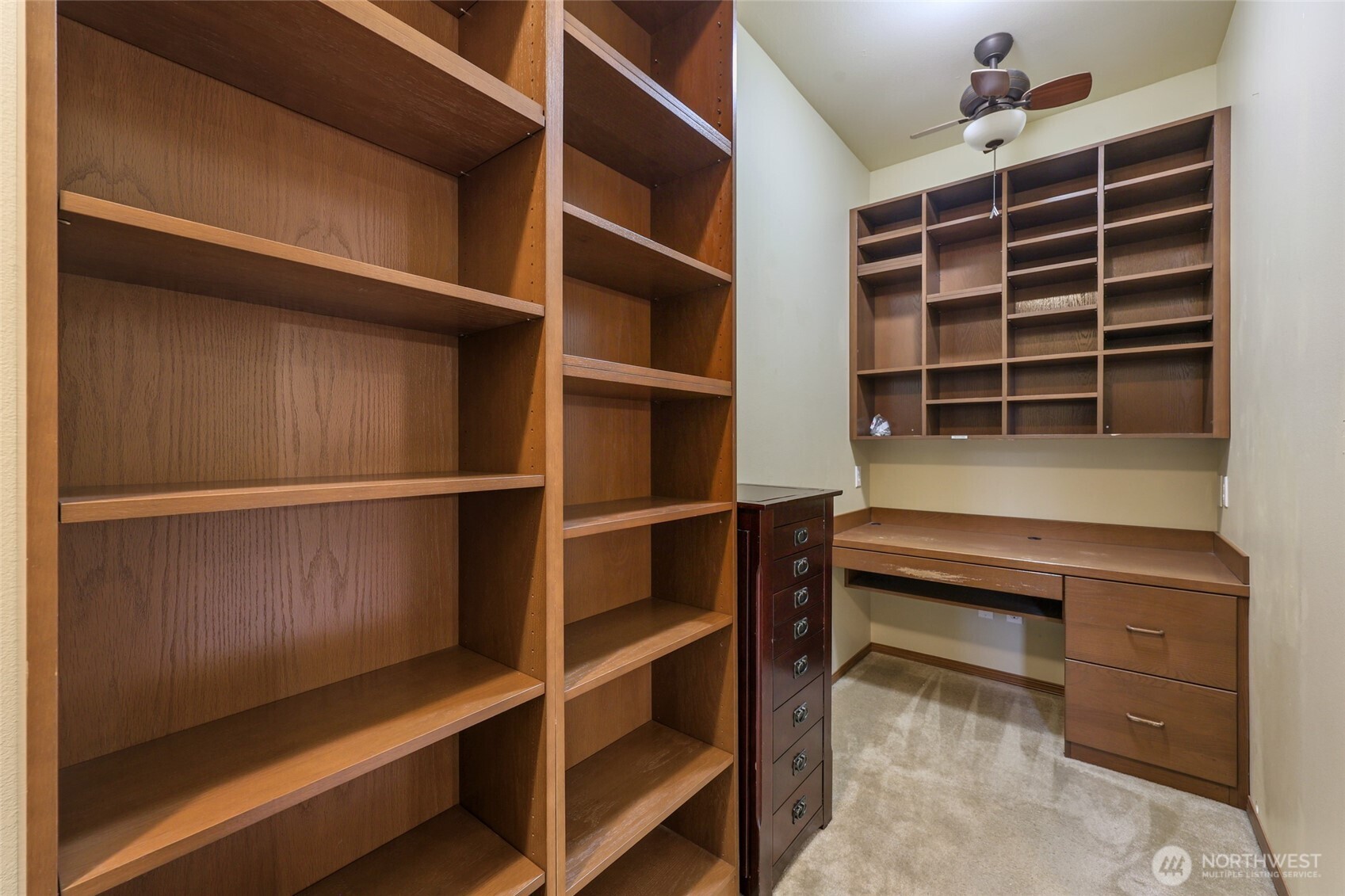 5107 66th Avenue Southeast Lacey, WA 98513 - Photo 15 of 27 a view of walk in closet with empty racks