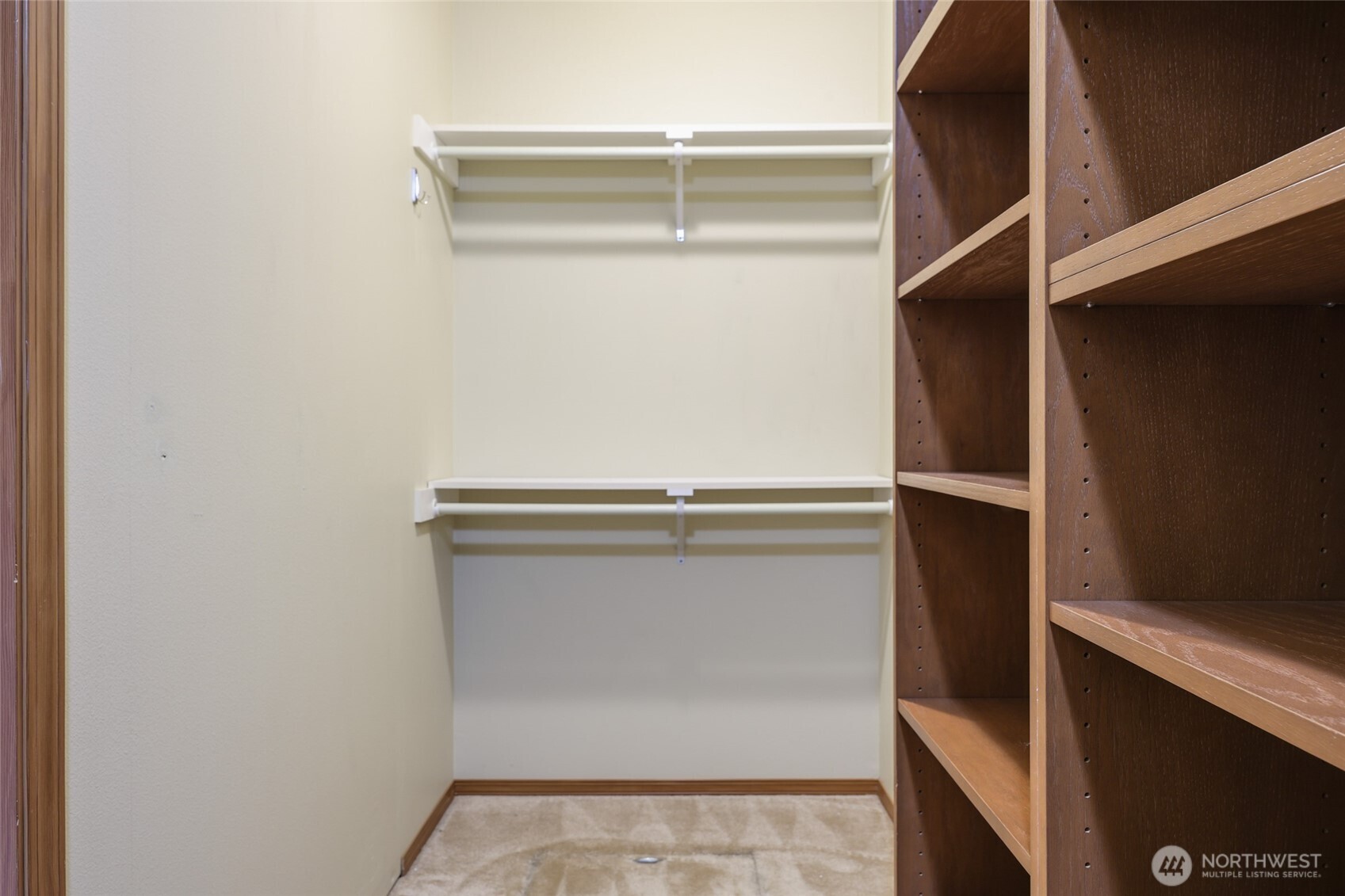 5107 66th Avenue Southeast Lacey, WA 98513 - Photo 16 of 27 a view of walk in closet with empty racks