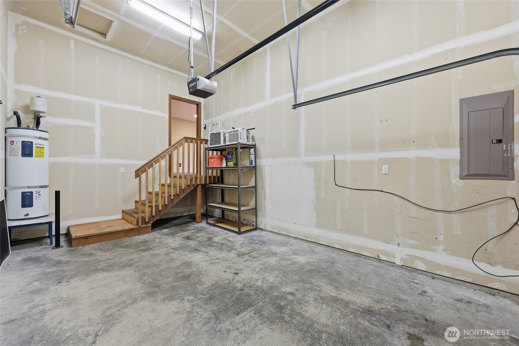 5107 66th Avenue Southeast Lacey, WA 98513 - Photo 23 of 27 a view of an empty room with stairs