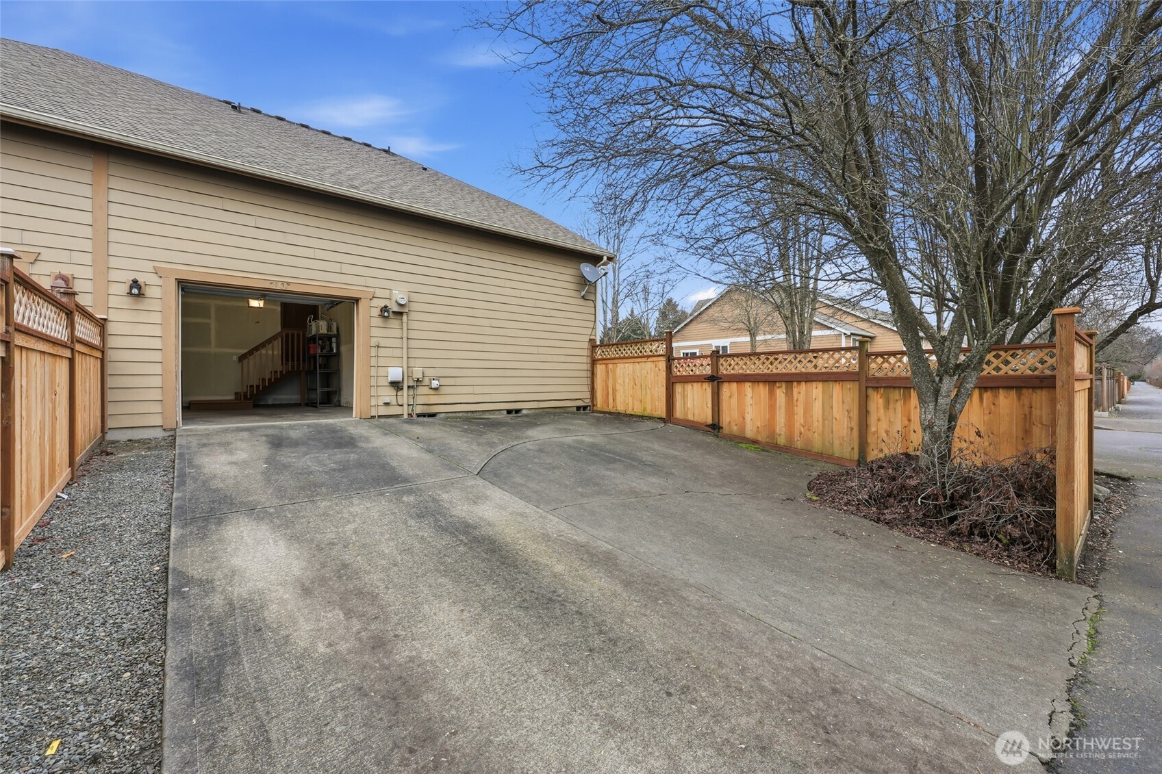 5107 66th Avenue Southeast Lacey, WA 98513 - Photo 24 of 27 a view of backyard with large tree