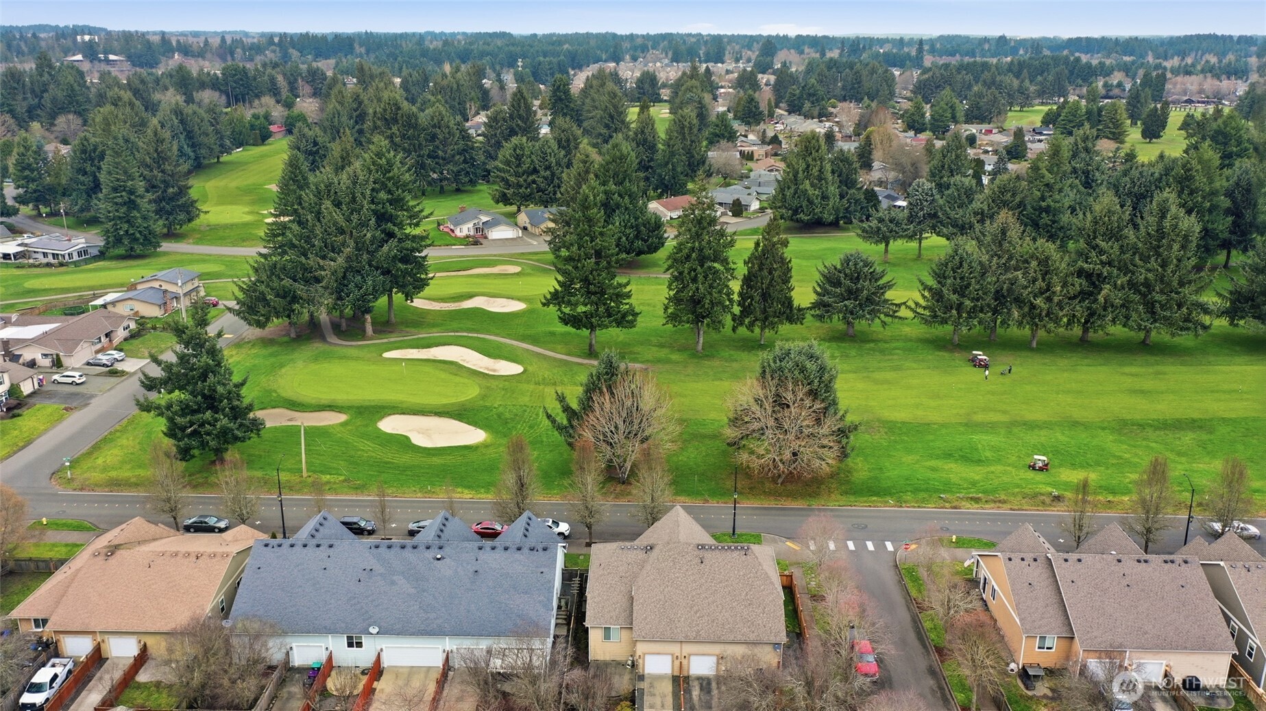 5107 66th Avenue Southeast Lacey, WA 98513 - Photo 4 of 27 an aerial view of a house with garden space and outdoor space