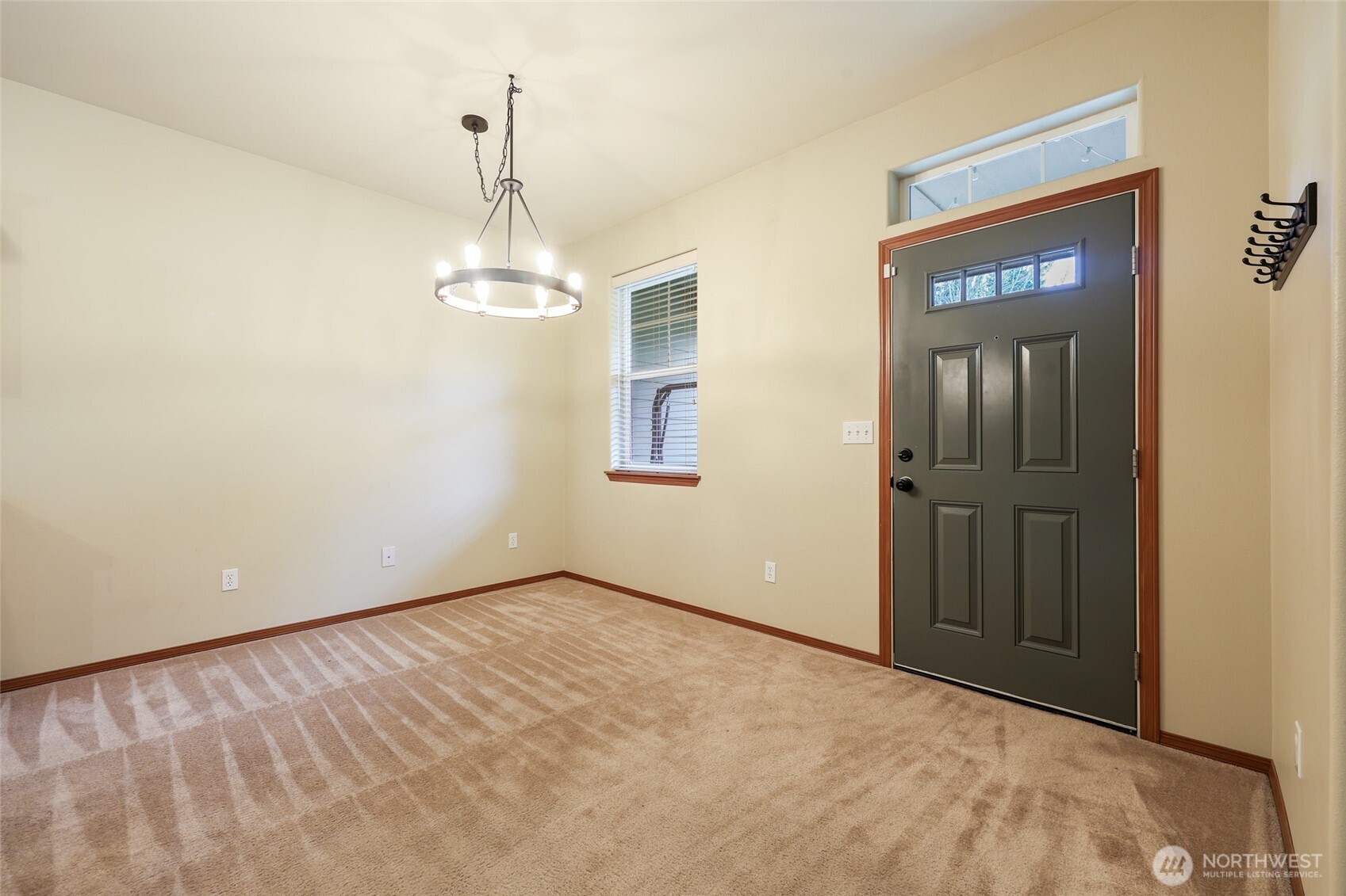5107 66th Avenue Southeast Lacey, WA 98513 - Photo 5 of 27 an empty room with windows and closet