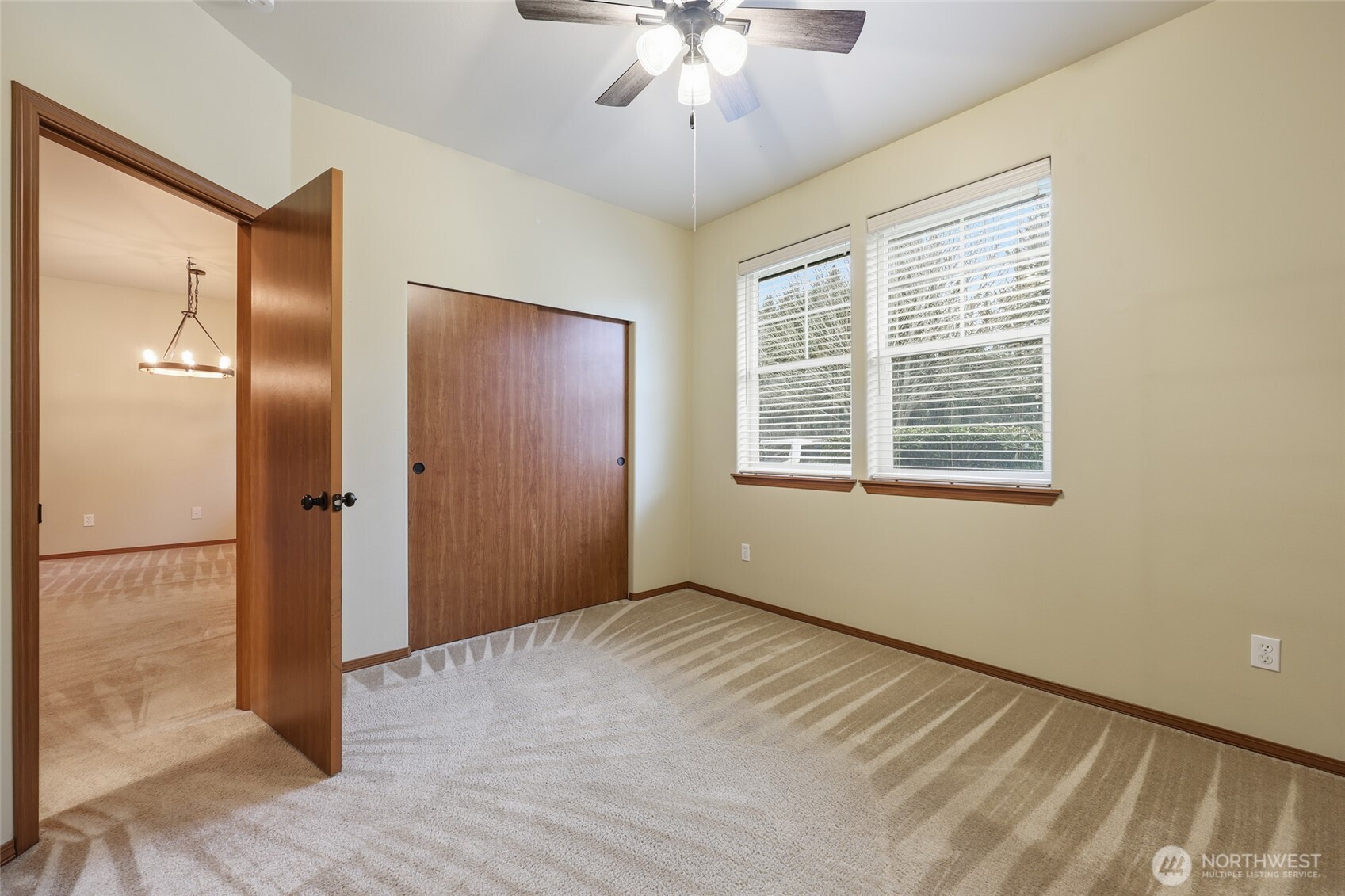 5107 66th Avenue Southeast Lacey, WA 98513 - Photo 8 of 27 a view of an empty room with a window
