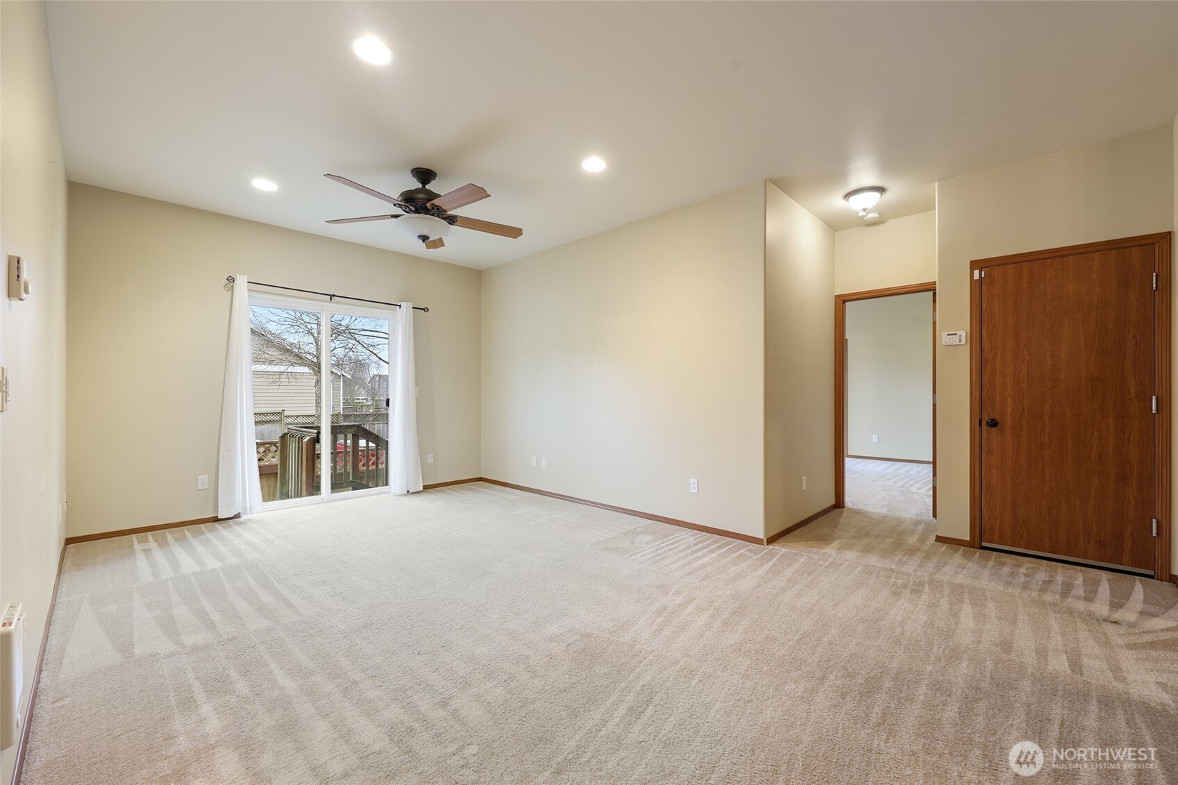 5107 66th Avenue Southeast Lacey, WA 98513 - Photo 10 of 27 a view of an empty room with a window