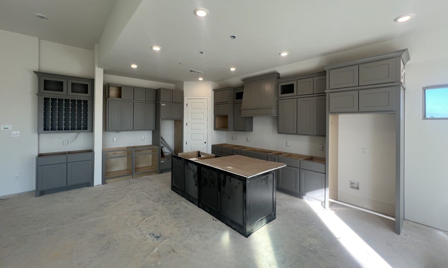 652 Cross Timbers Trace Hempstead, TX 77445 - Photo 2 of 13 a kitchen with kitchen island a counter top space stainless steel appliances and cabinets