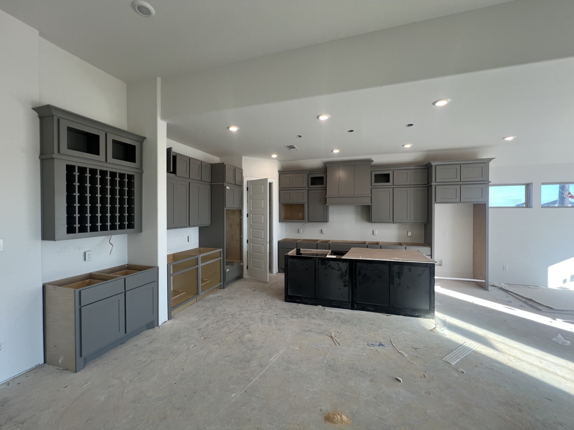 652 Cross Timbers Trace Hempstead, TX 77445 - Photo 3 of 13 a large kitchen with stainless steel appliances kitchen island granite countertop a large counter top and a stove top oven