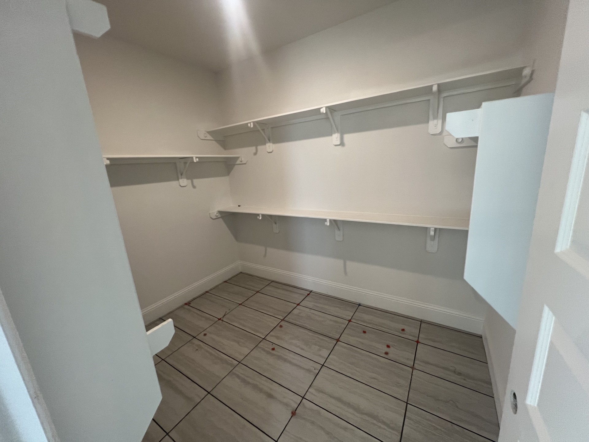652 Cross Timbers Trace Hempstead, TX 77445 - Photo 10 of 13 a view of an empty walk in closet