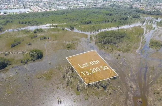 a view of a field with beach