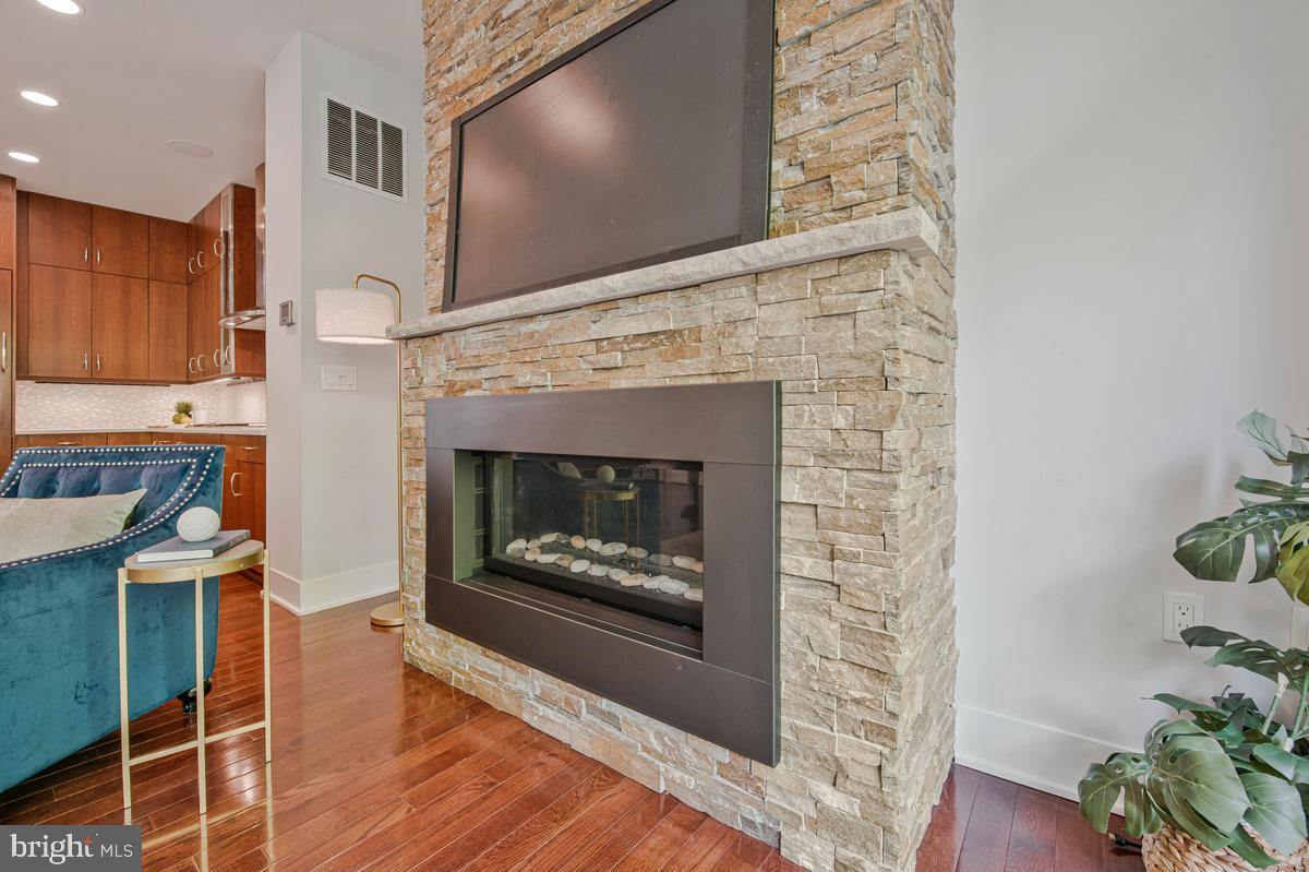 5131 Willet Bridge Road Bethesda, MD 20816 - Photo 12 of 42 Gas fireplace in main living area