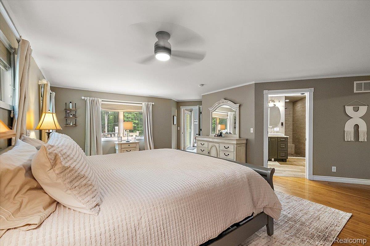 4219 Gardner Road Metamora, MI 48455 - Photo 19 of 84 Bright bedroom with hardwood-finish flooring and a ceiling fan