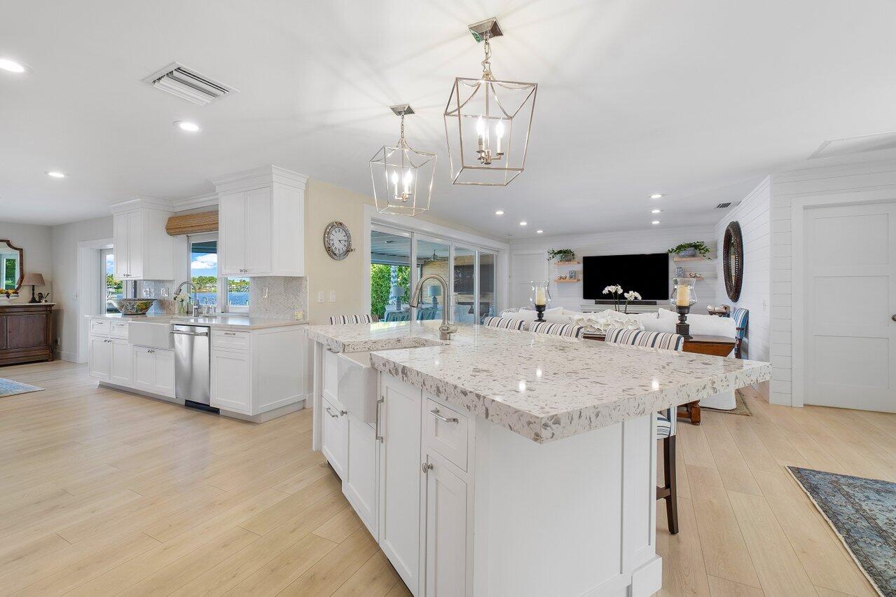 19 Saddleback Road Tequesta, FL 33469 - Photo 15 of 49 Kitchen Bar to Living Room
