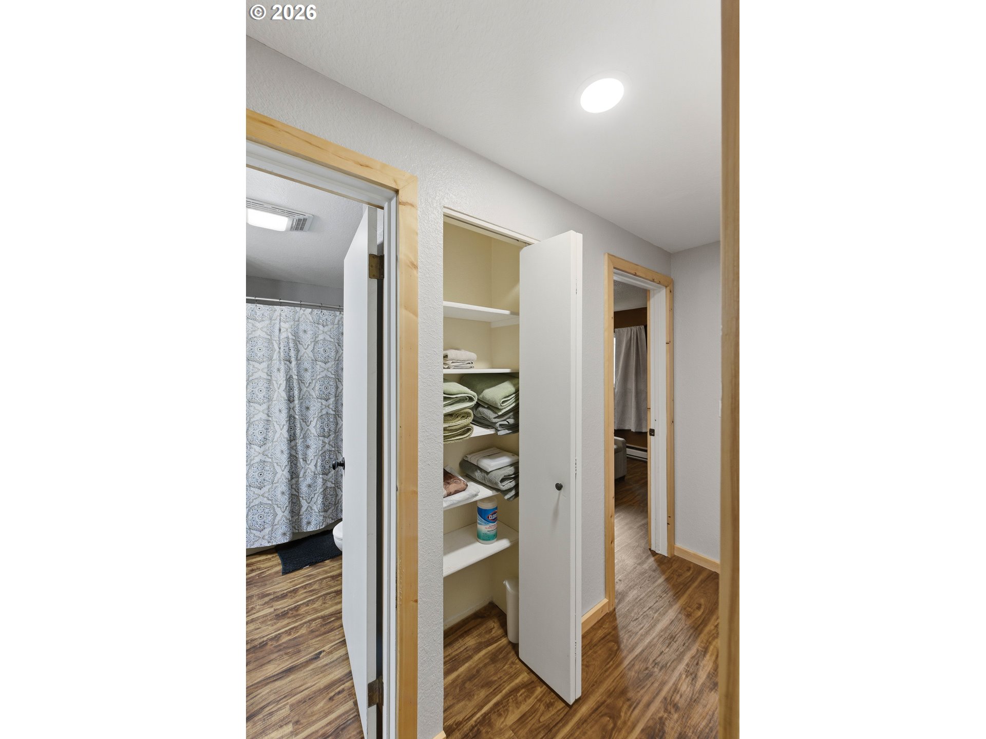 192 North Wood Ridge Road Coquille, OR 97423 - Photo 26 of 42 a picture of a room with a door open to a room