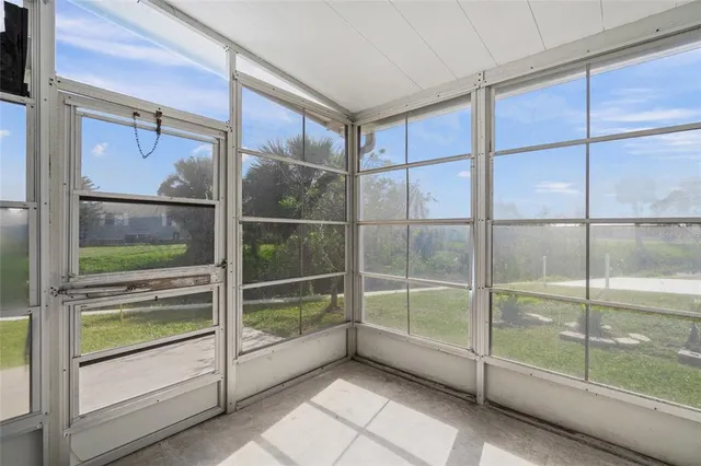 a view of a house with backyard