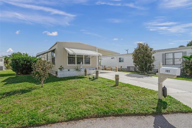 a house view with a garden space