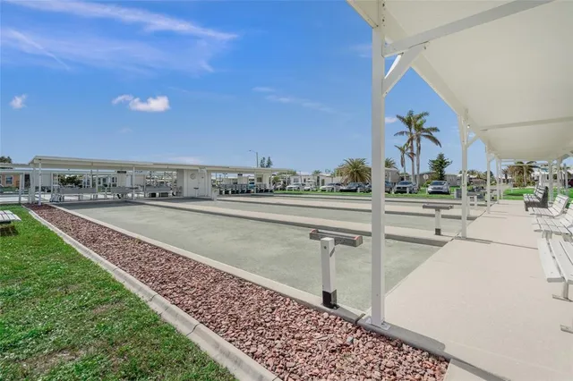 a view of an outdoor space and tennis court