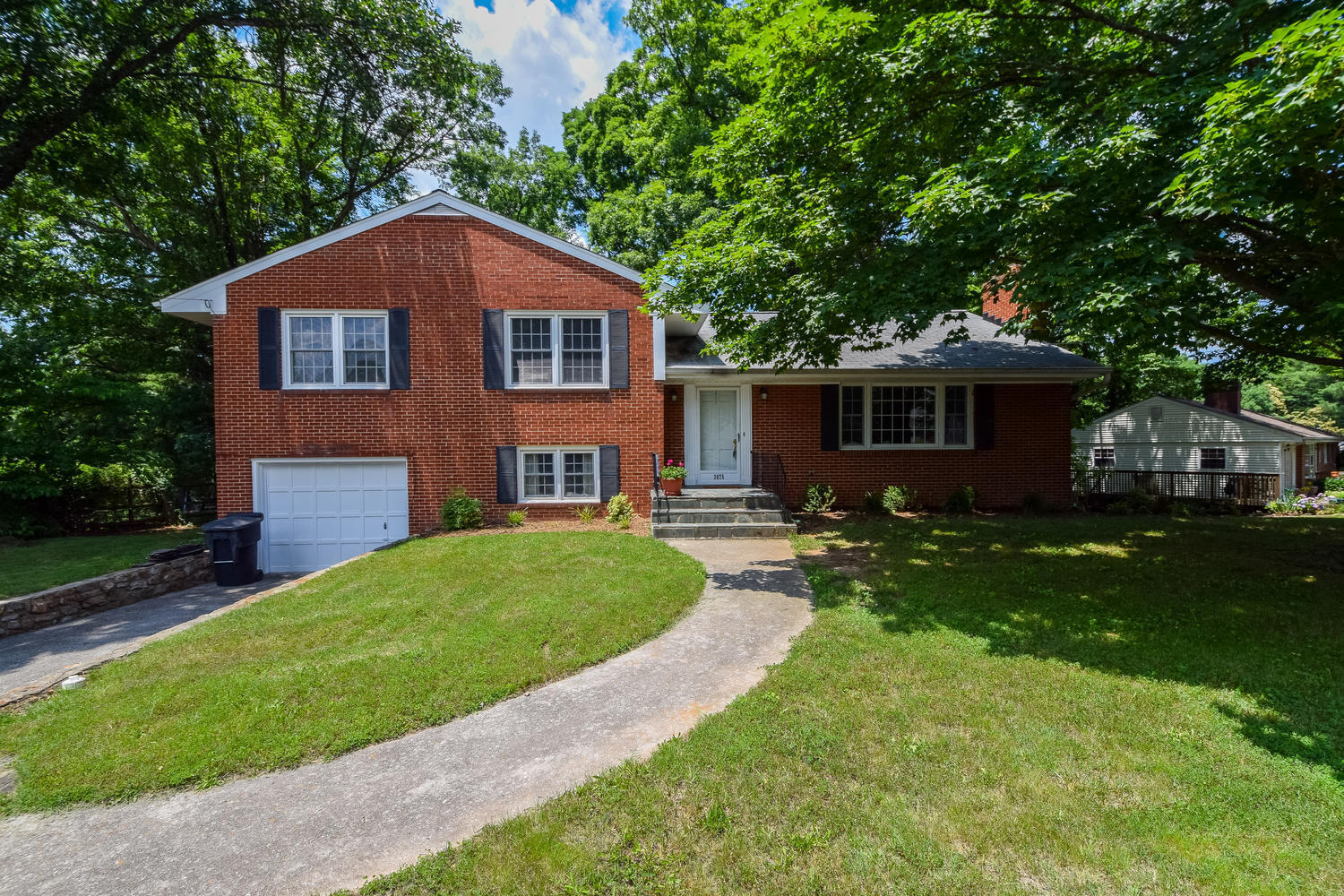 3075 Sedgefield Road Southwest Roanoke, VA 24018 - Photo 1 of 30 a house view with a garden space