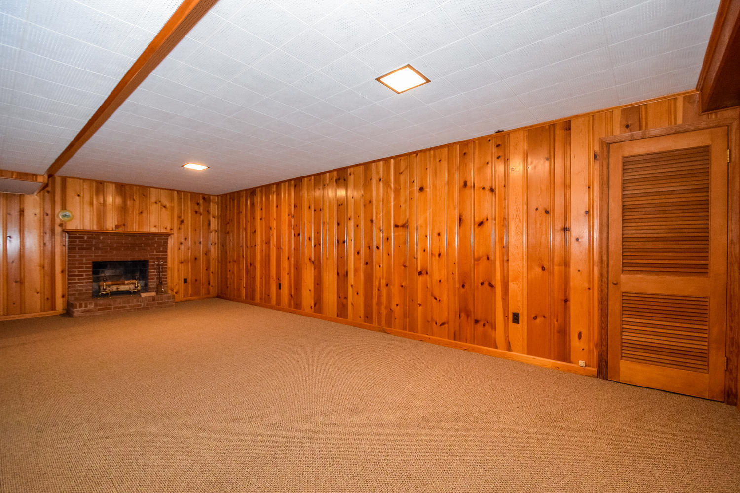3075 Sedgefield Road Southwest Roanoke, VA 24018 - Photo 17 of 30 a view of an empty room with a fireplace