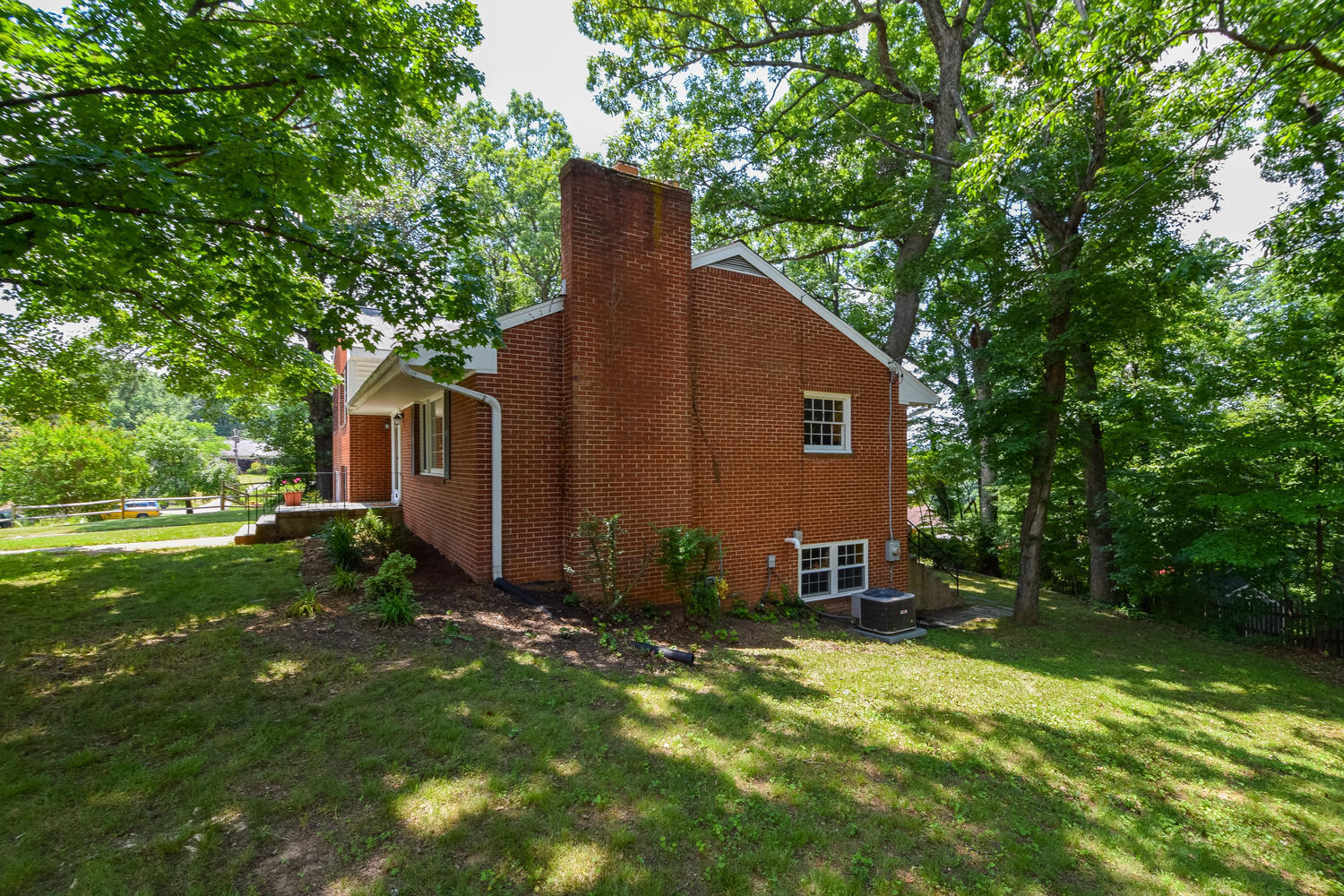 3075 Sedgefield Road Southwest Roanoke, VA 24018 - Photo 22 of 30 a view of backyard of house with green space