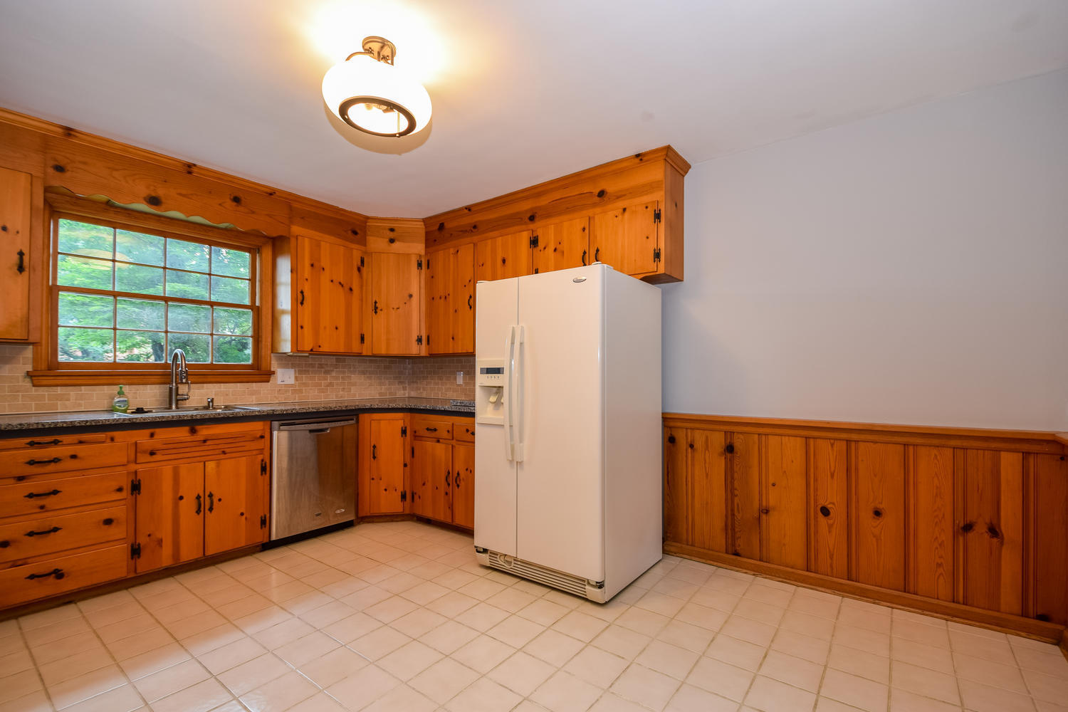 3075 Sedgefield Road Southwest Roanoke, VA 24018 - Photo 8 of 30 a kitchen with a refrigerator and a sink