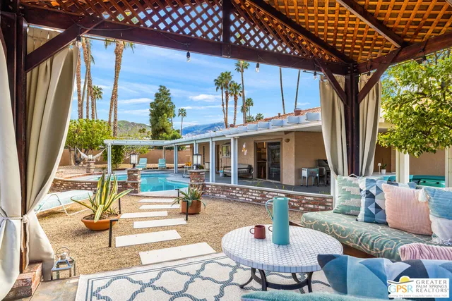 a front view of a building with garden