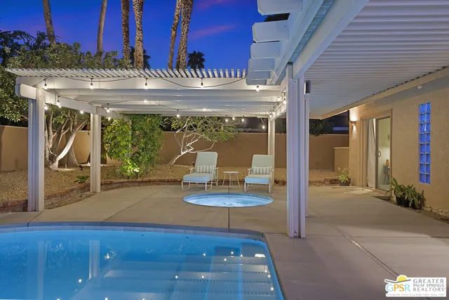 a kitchen with stainless steel appliances a refrigerator and a stove
