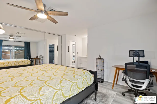 a en suite bathroom with double vanity sinks and a mirror