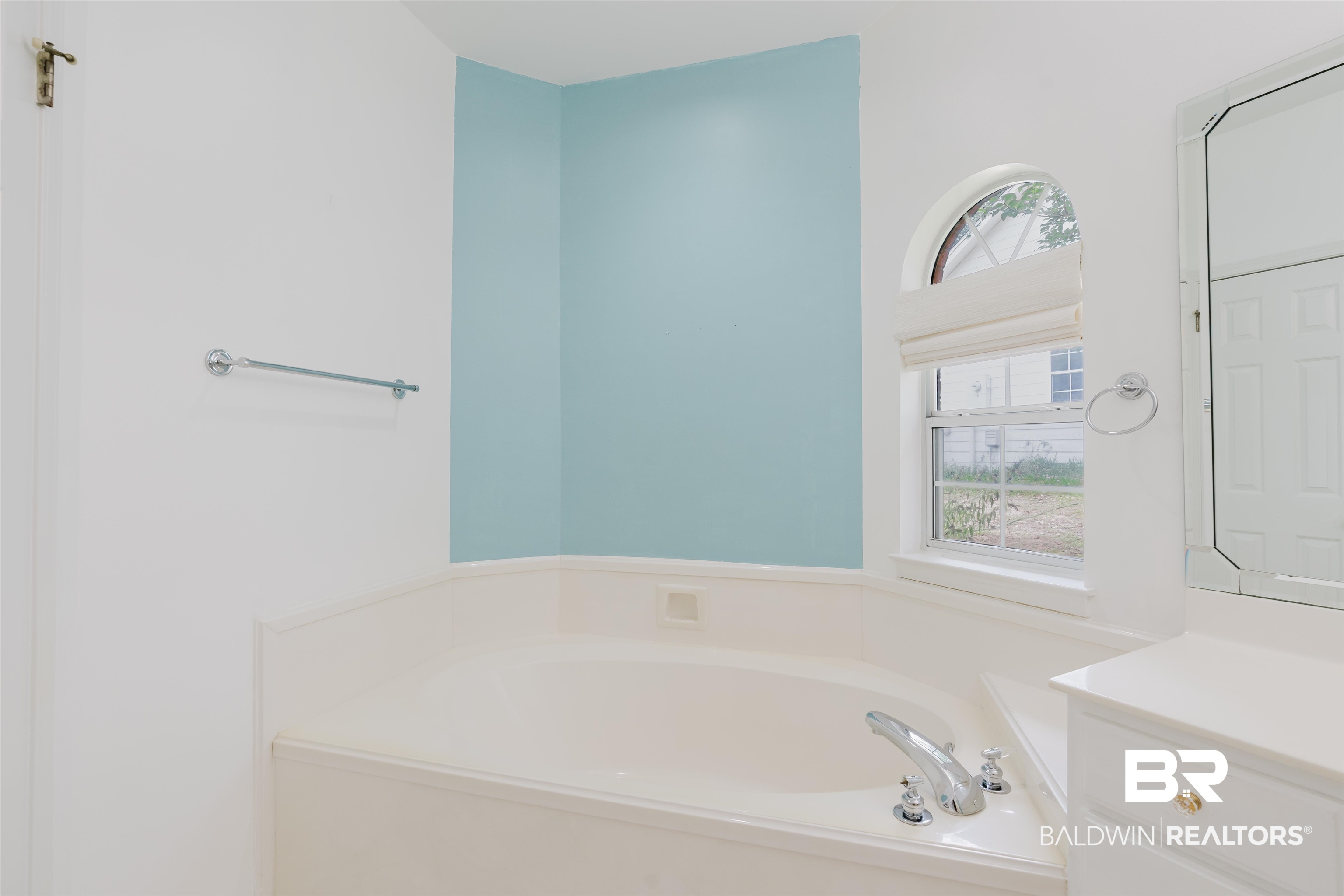 19711 Hunters Loop Fairhope, AL 36532 - Photo 21 of 49 Bathroom featuring a garden tub and vanity