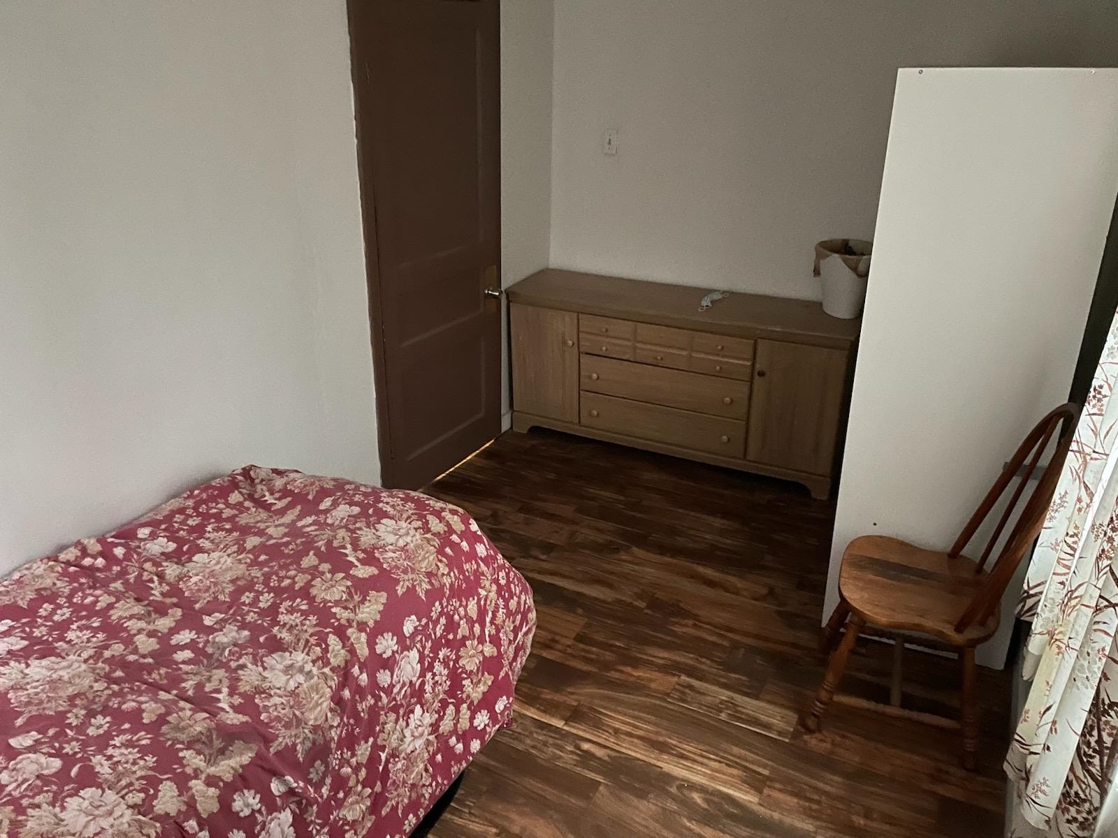 3533 Kendrick Road Memphis, TN 38108 - Photo 9 of 13 Bedroom with dark wood-type flooring