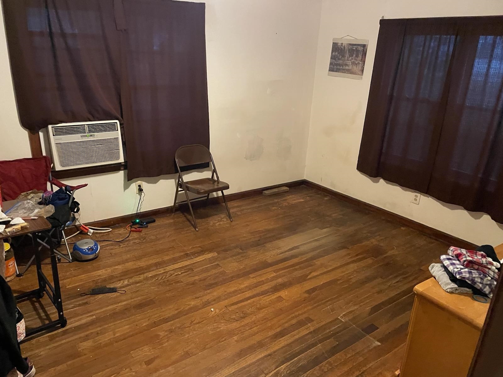 3533 Kendrick Road Memphis, TN 38108 - Photo 10 of 13 Empty room with dark wood-style flooring and cooling unit