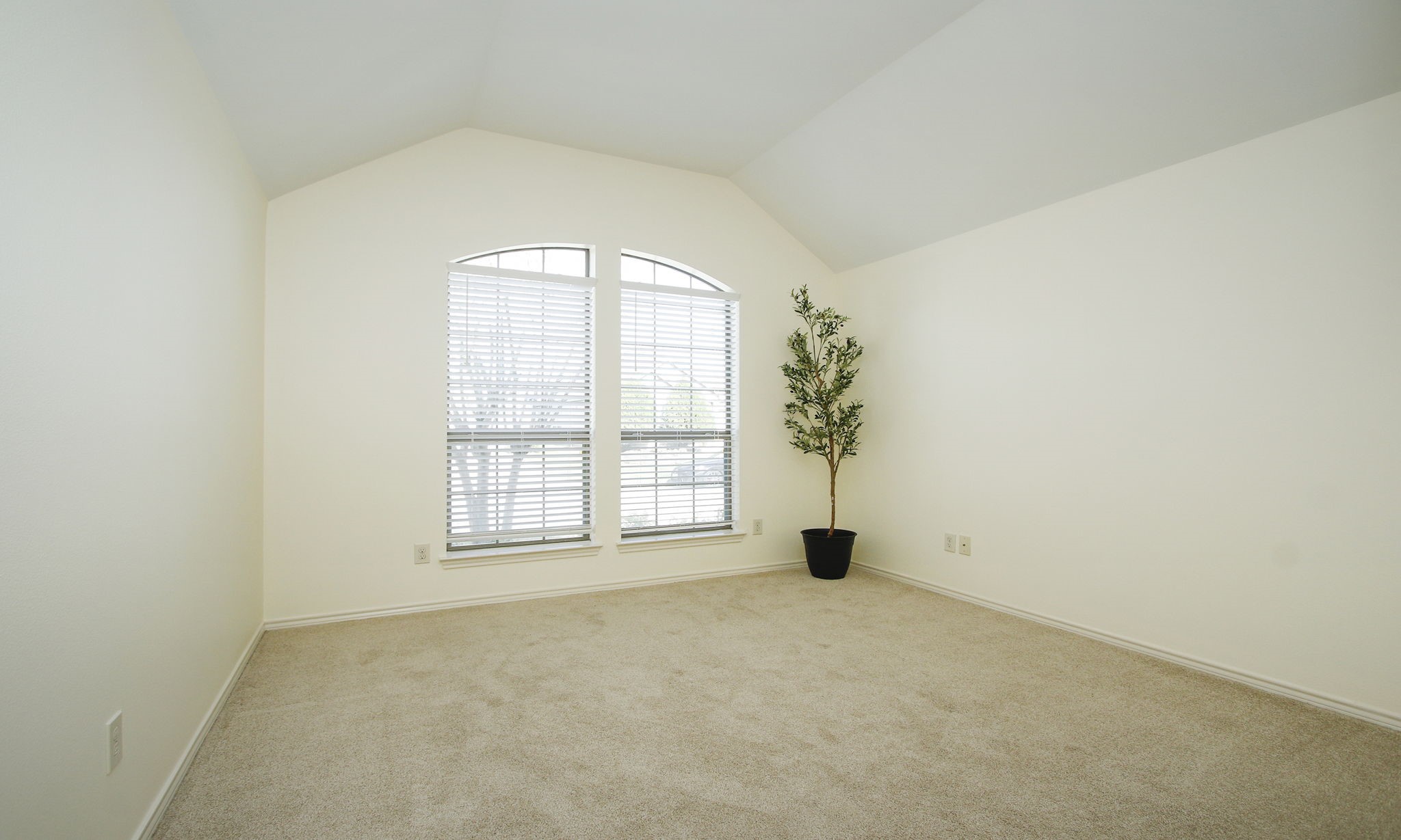 11123 Pembroke Ridge Drive Houston, TX 77065 - Photo 11 of 43 an empty room with windows