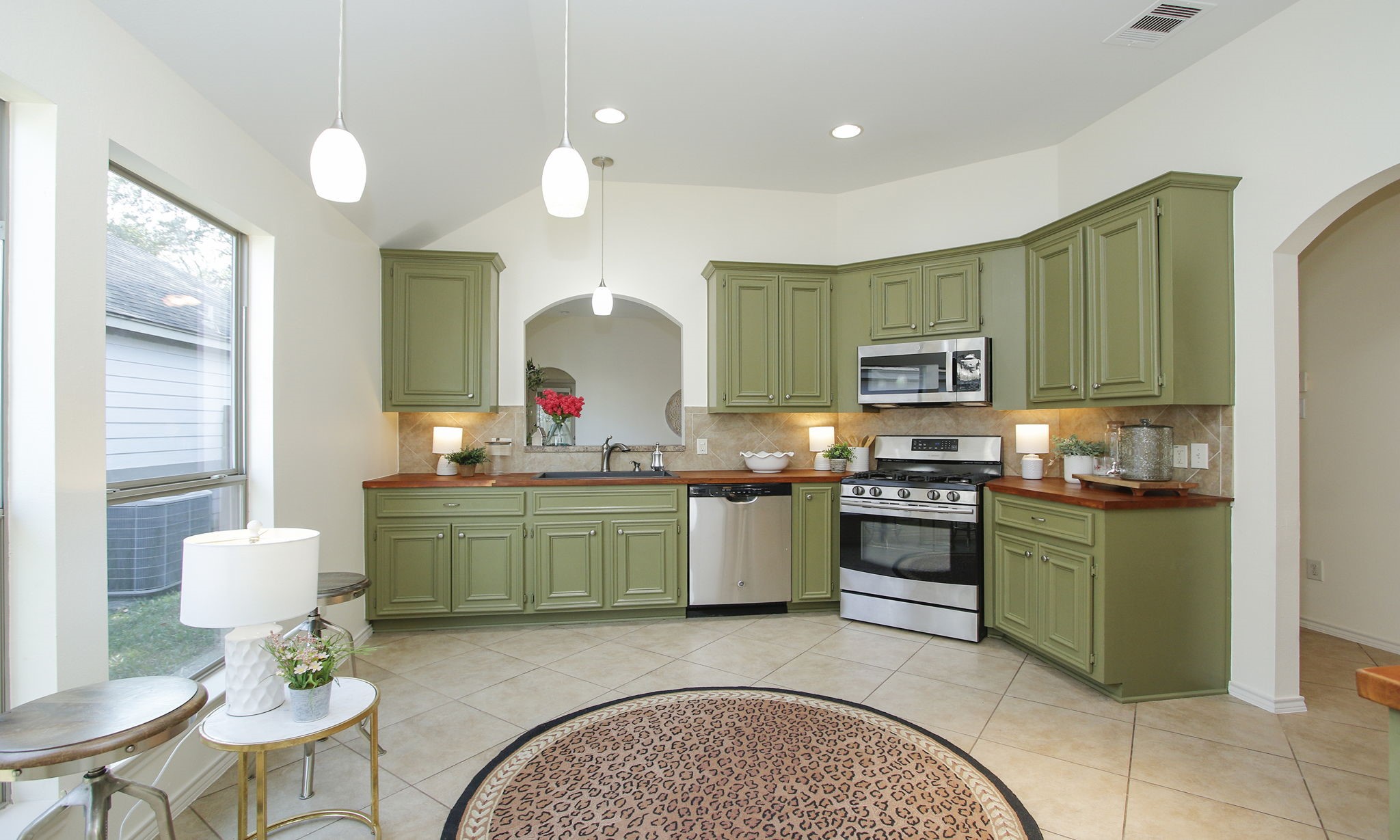 11123 Pembroke Ridge Drive Houston, TX 77065 - Photo 14 of 43 a kitchen with a sink and cabinets