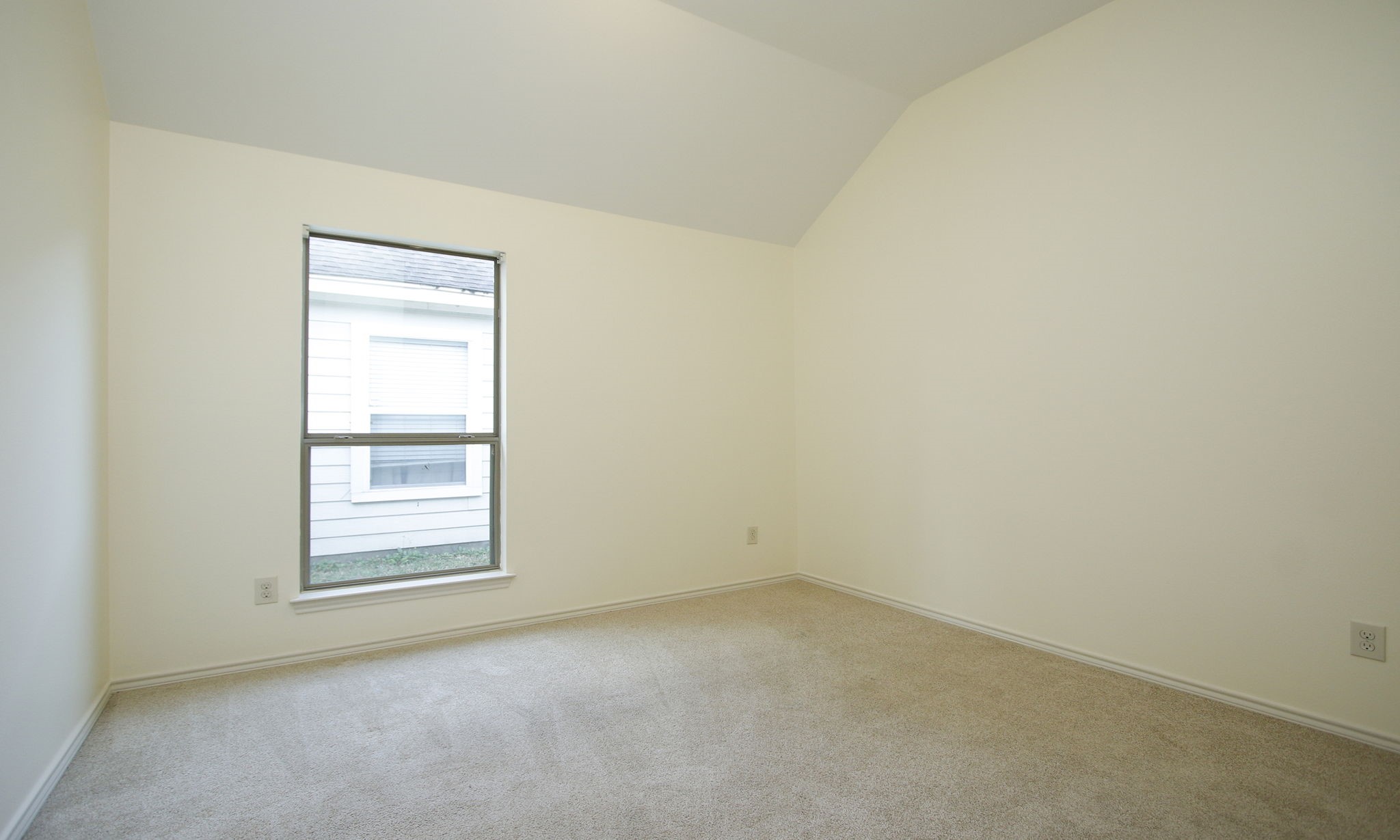 11123 Pembroke Ridge Drive Houston, TX 77065 - Photo 27 of 43 an empty room with a window