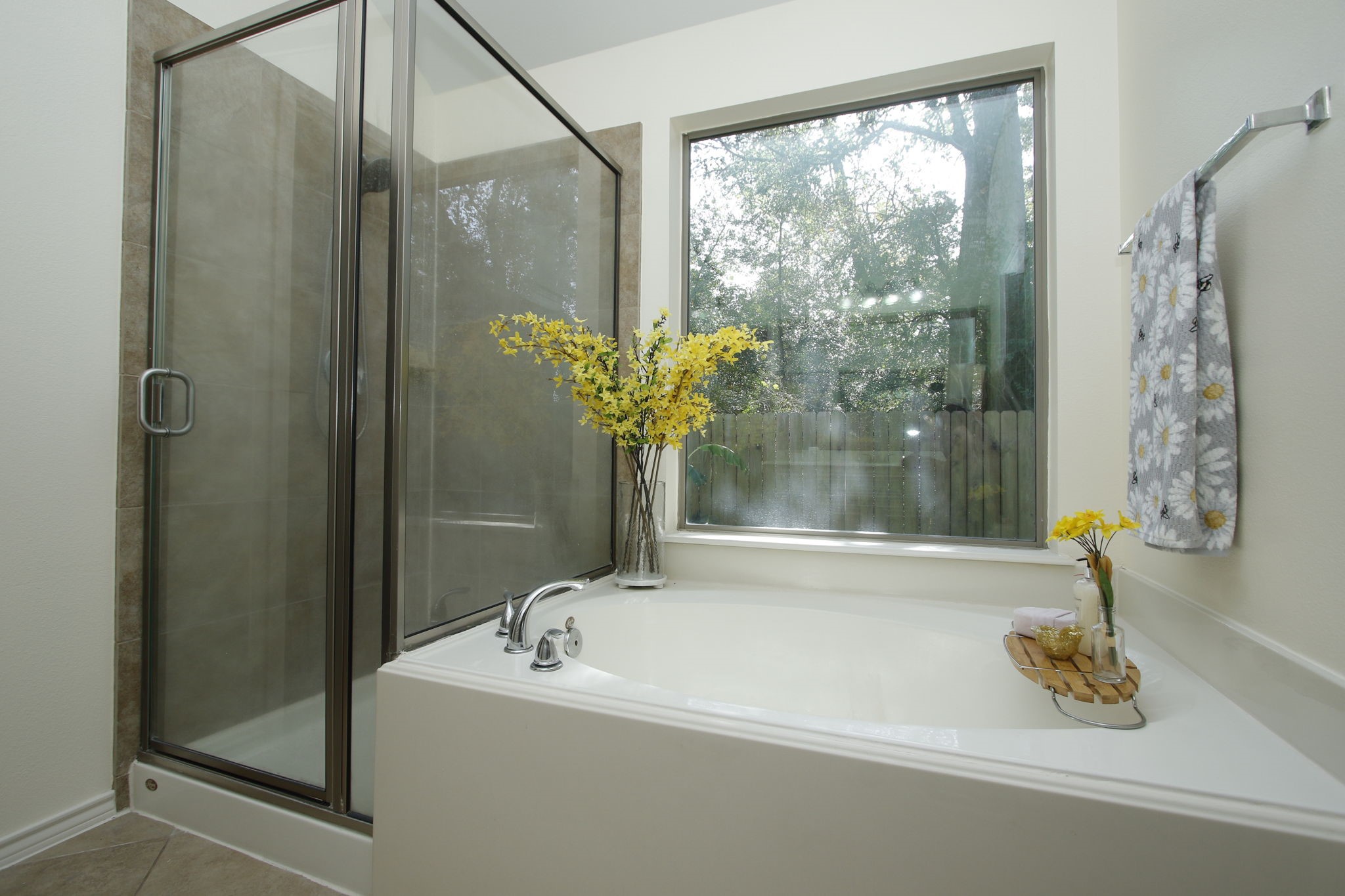 11123 Pembroke Ridge Drive Houston, TX 77065 - Photo 36 of 43 a bathroom with a tub and shower